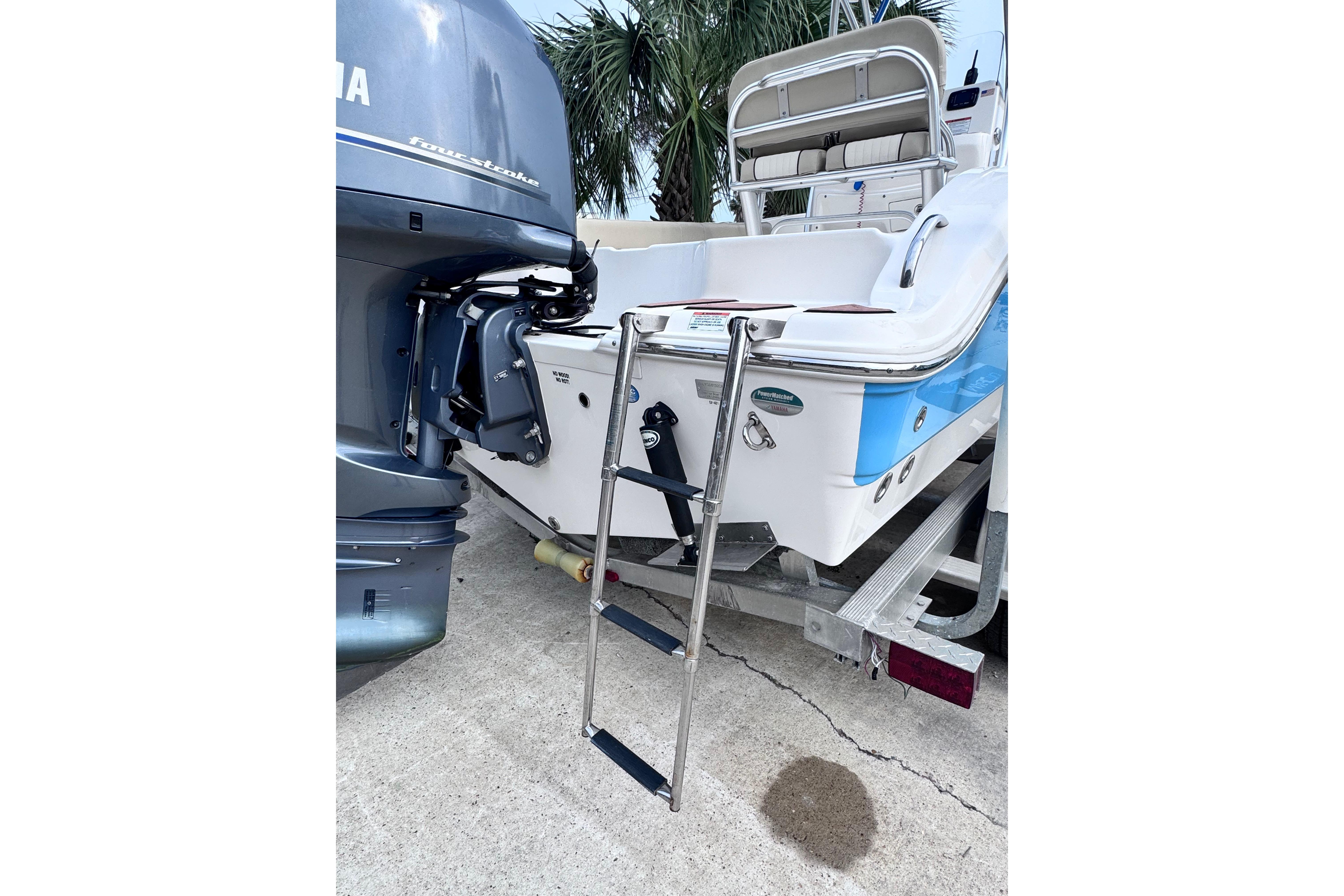 2018 Sea Fox 206 Commander boat with Yamaha outboard motor and boarding ladder.