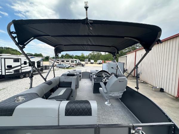 2024 Massimo Marine P-21R pontoon boat with canopy, gray seating, and steering console.