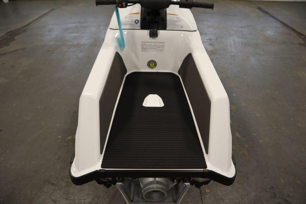 2025 Yamaha WaveRunner SuperJet, white and black interior, in a garage setting.