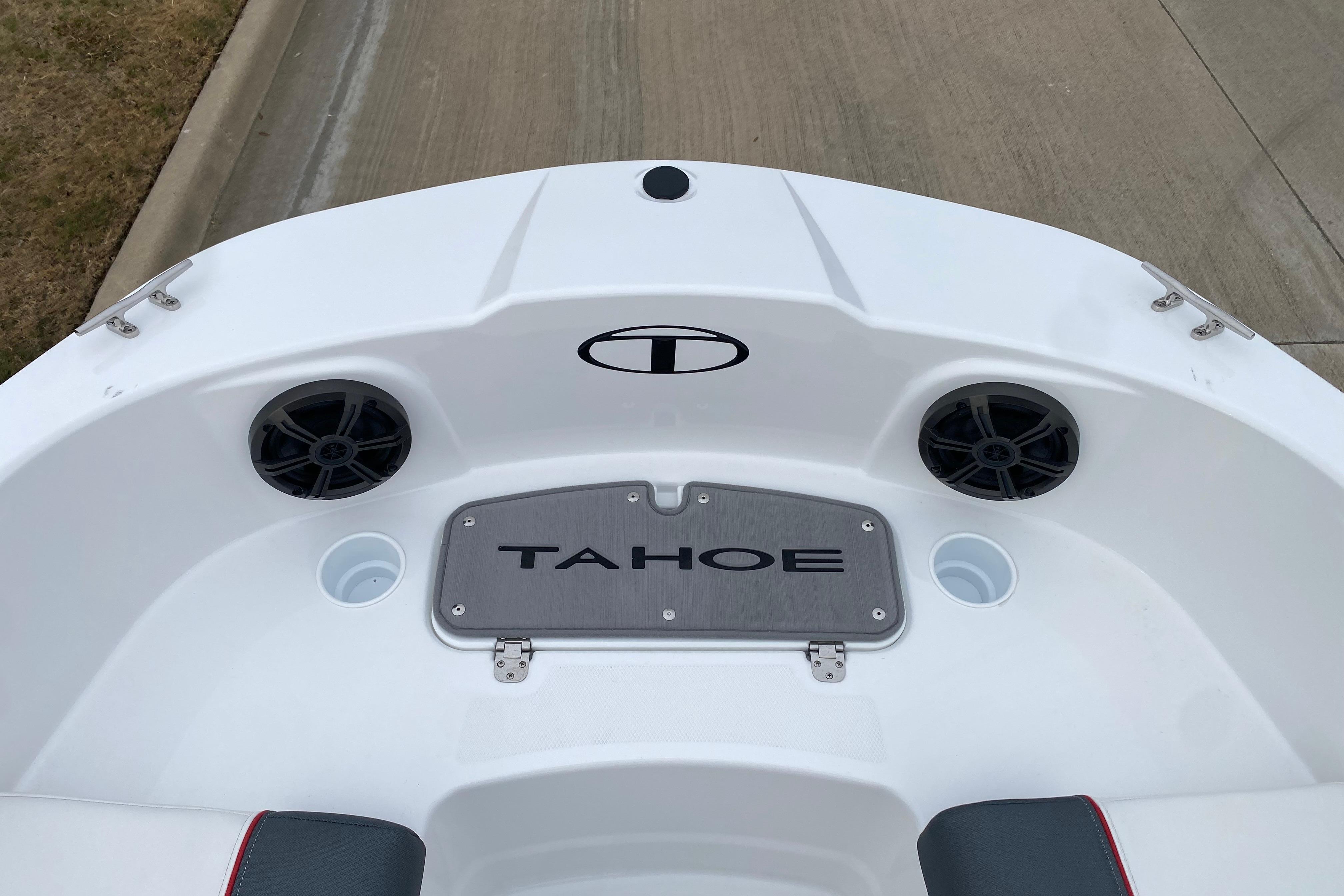 2026 Tahoe T21 boat interior with speakers and logo detail.
