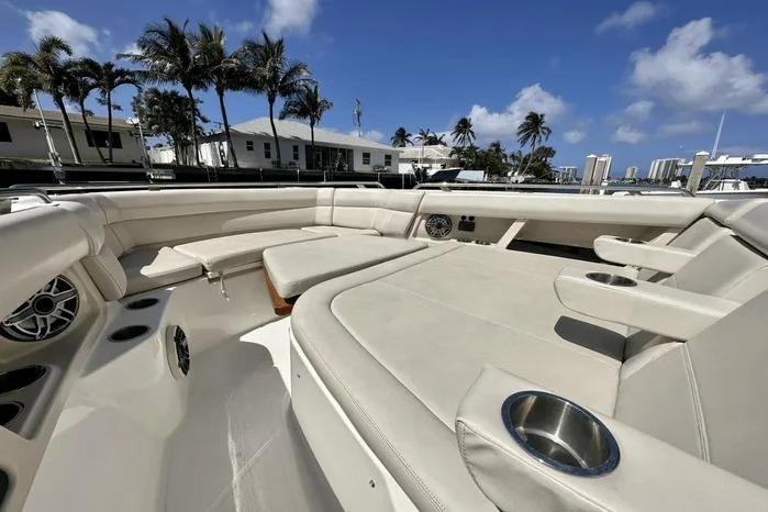 2019 Boston Whaler 350 Realm boat interior with luxurious seating and cup holders.