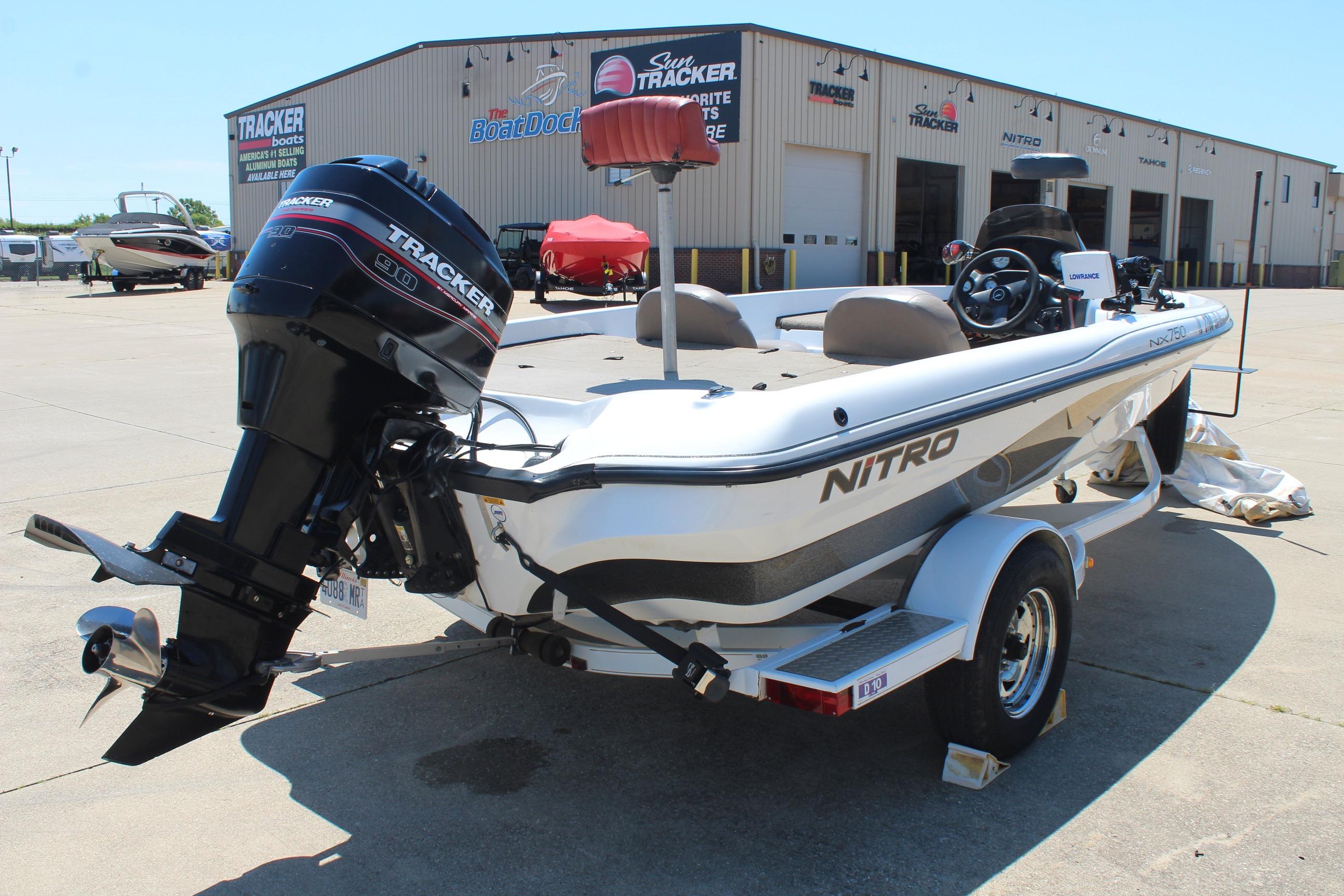 2003 Nitro NX 750 SC boat with Tracker engine at dealership.