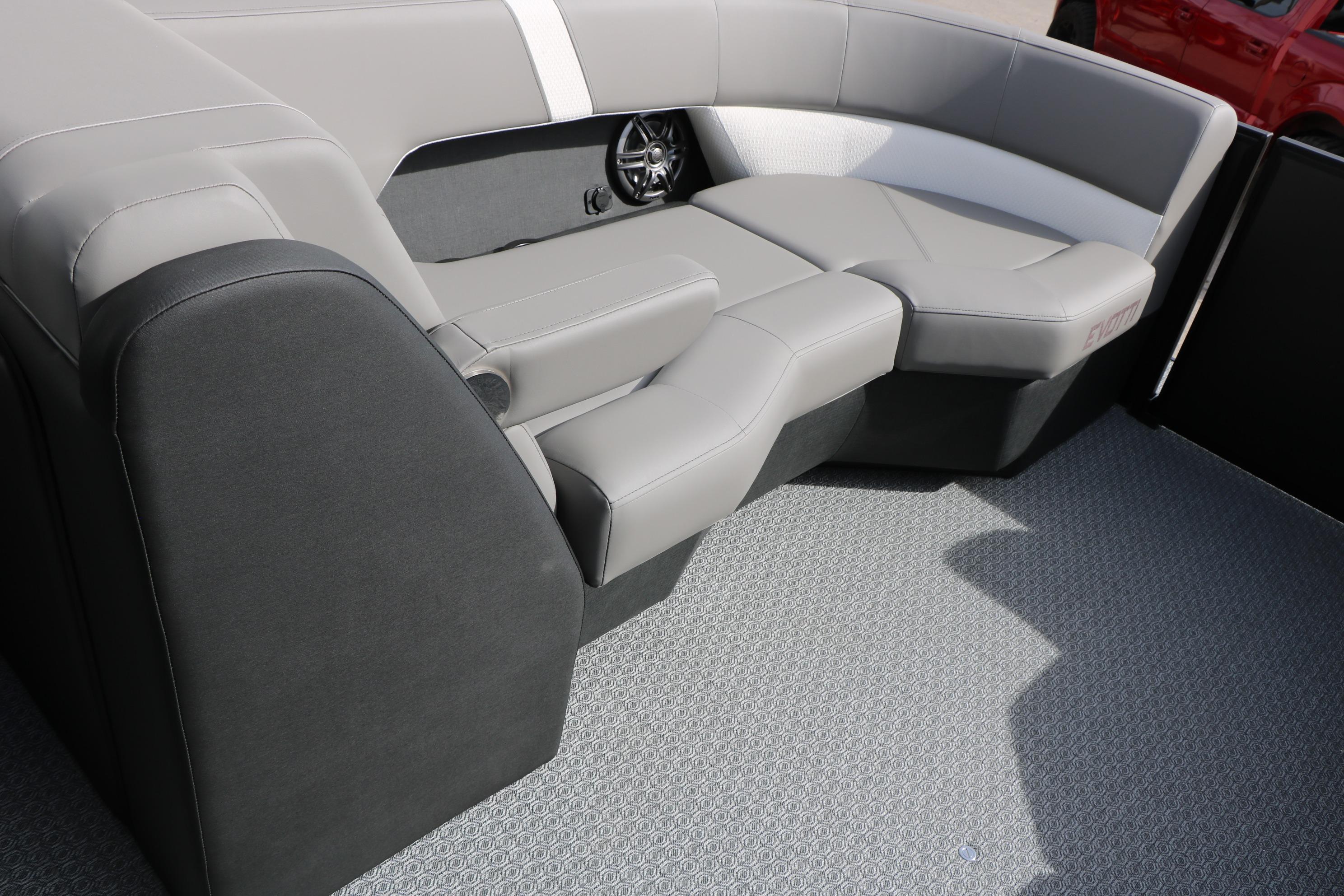 Luxurious seating in the 2026 Evotti 521QL boat, featuring sleek gray upholstery.