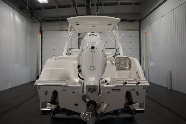 2025 Sea Fox 228 Traveler boat in a storage facility, rear view.
