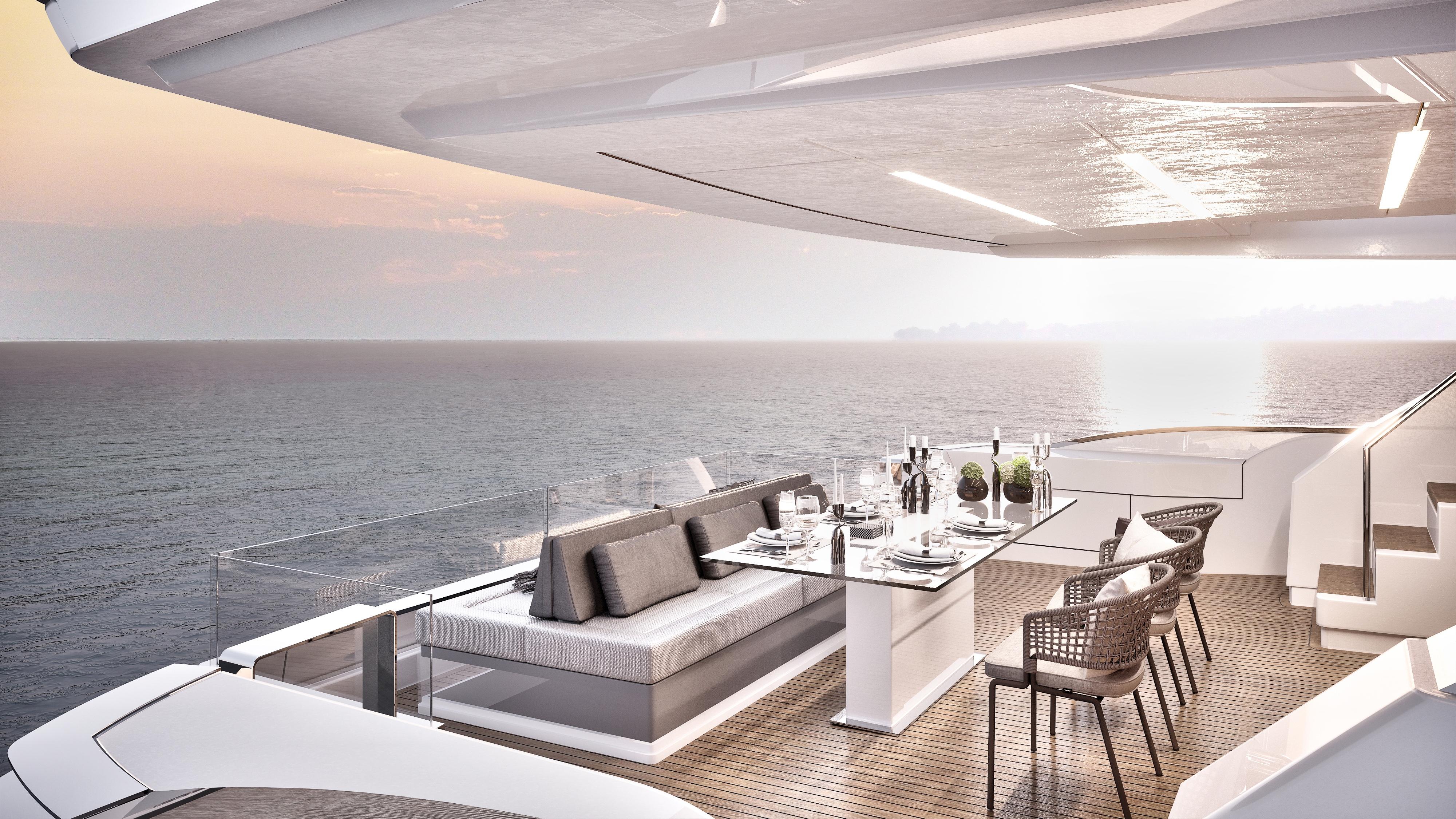 Luxurious 2026 Ladenstein L88 yacht deck with elegant dining area overlooking the ocean at sunset.