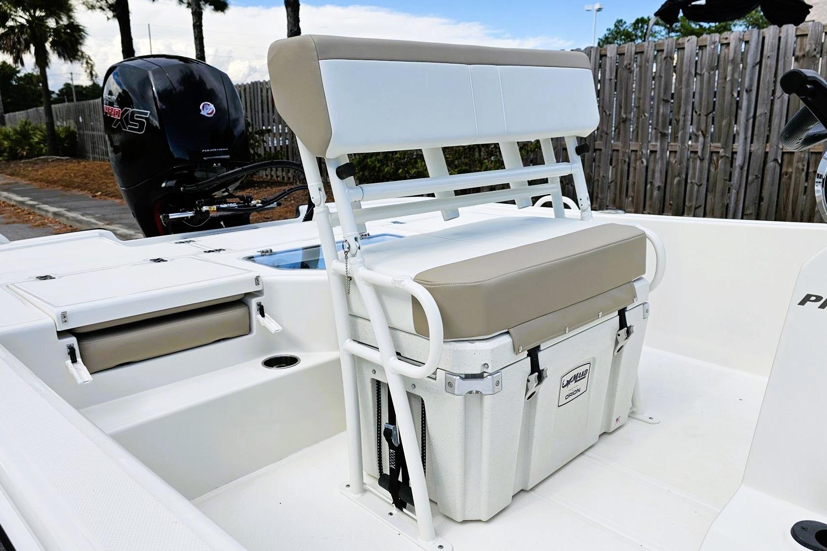 2026 Mako Pro Skiff 19 CC boat interior with seating and storage.
