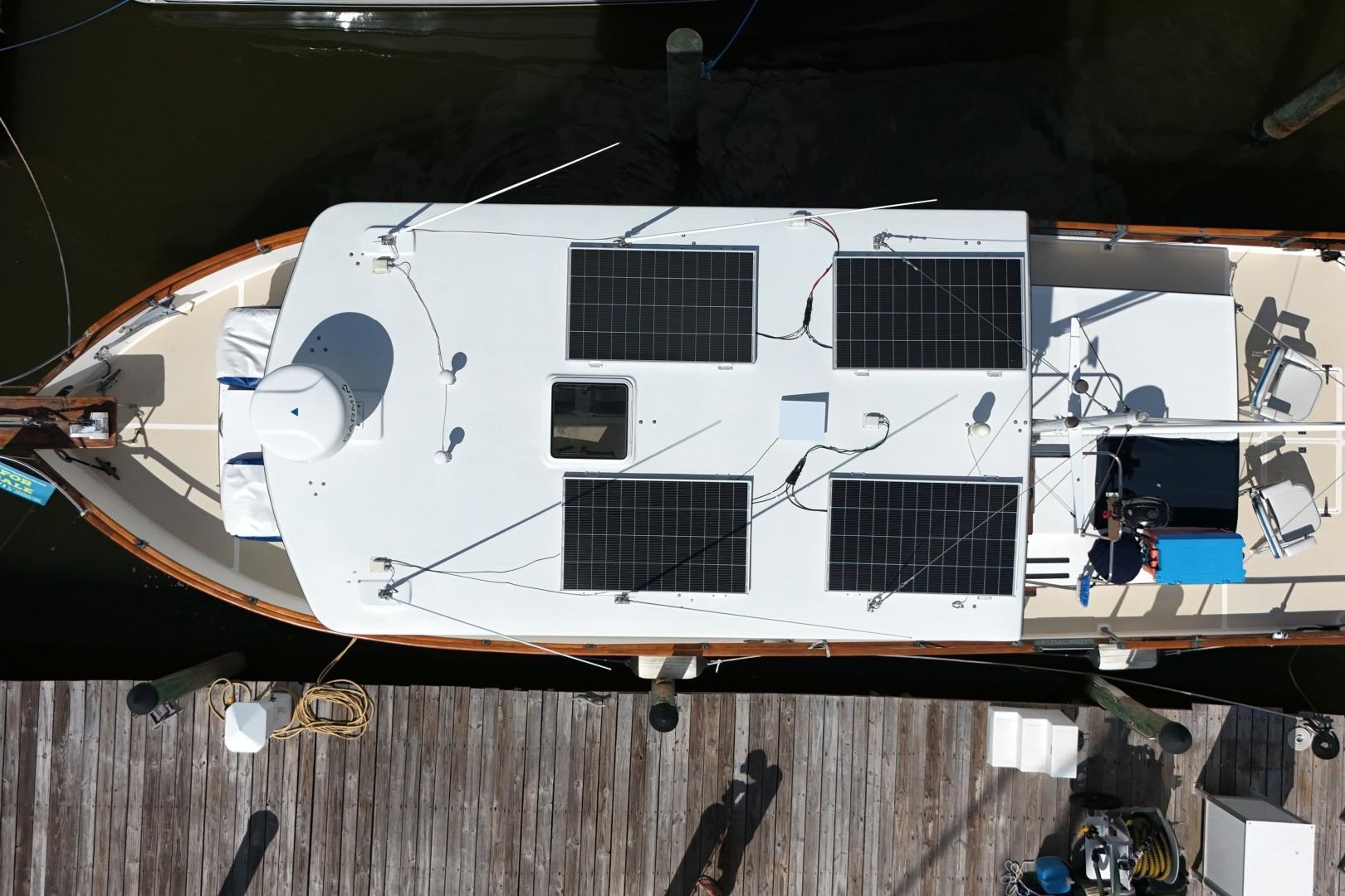 Overhead view of a 1978 Grand Banks 42 Classic boat with solar panels on deck.
