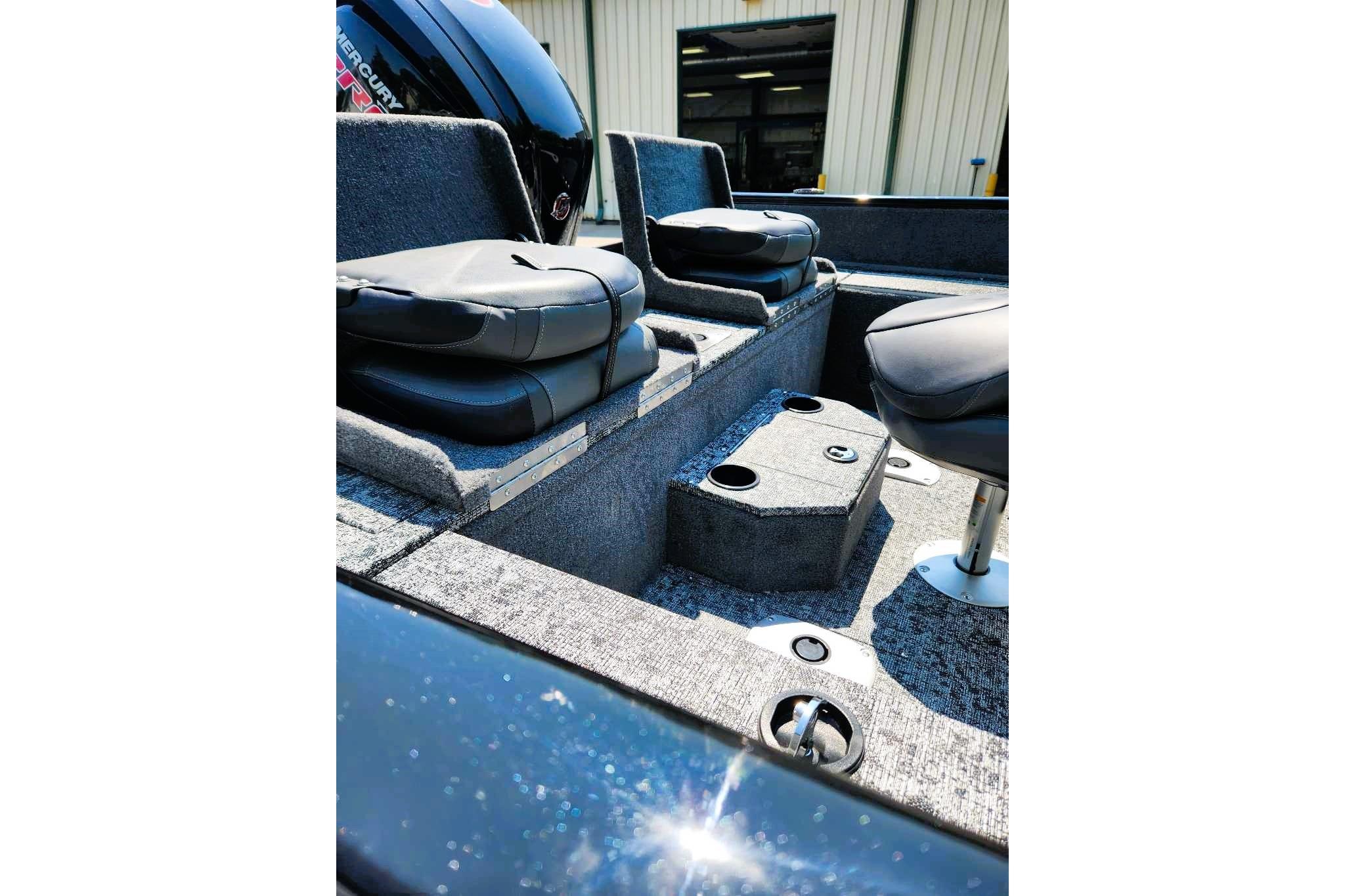 2026 Tracker Pro Guide V-175 Combo boat interior with cushioned seating and storage compartments.