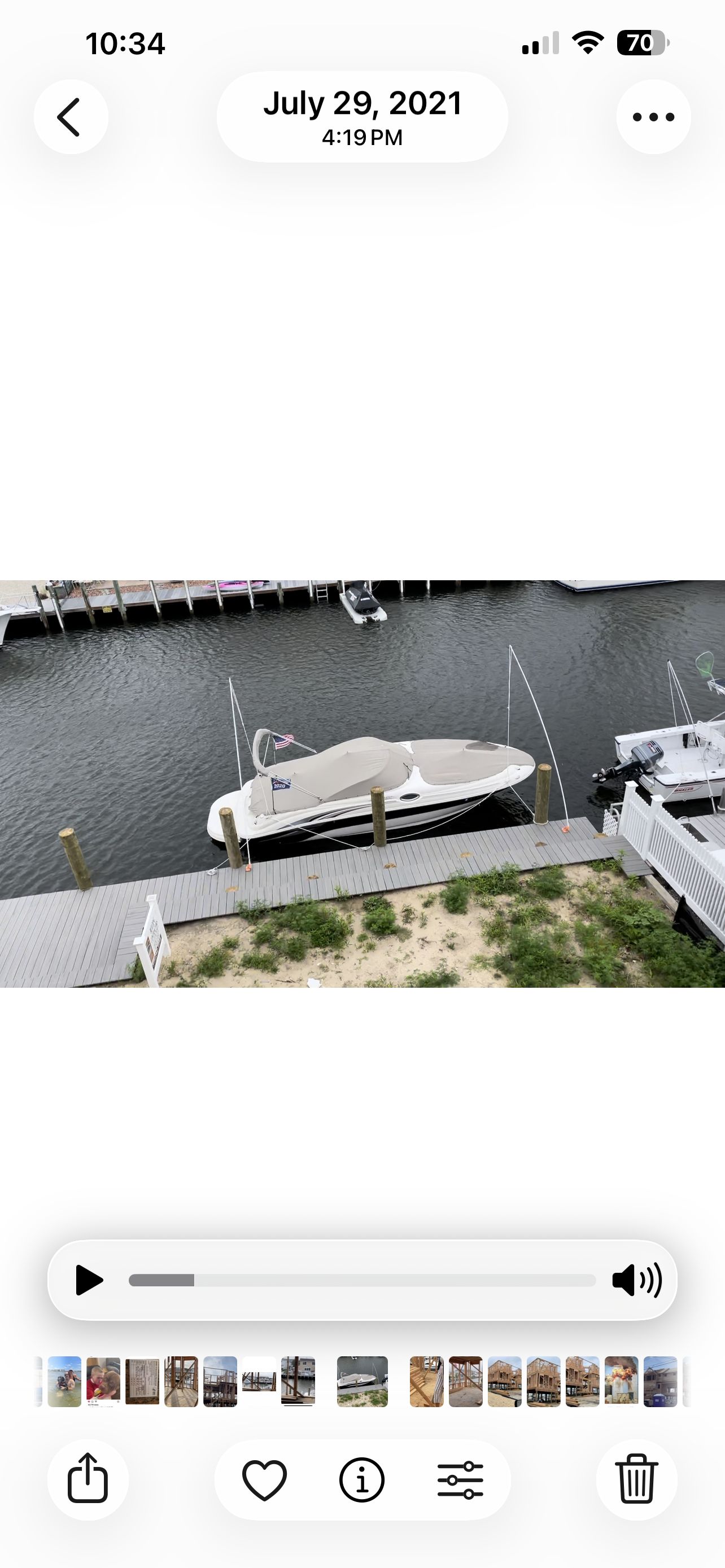 2003 Sea Ray 240 Sundeck docked by the water.