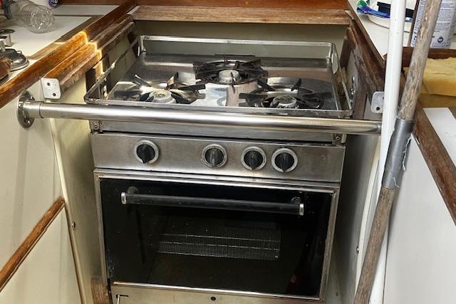 1979 Pearson 365 Ketch yacht kitchen with stainless steel stove and oven.