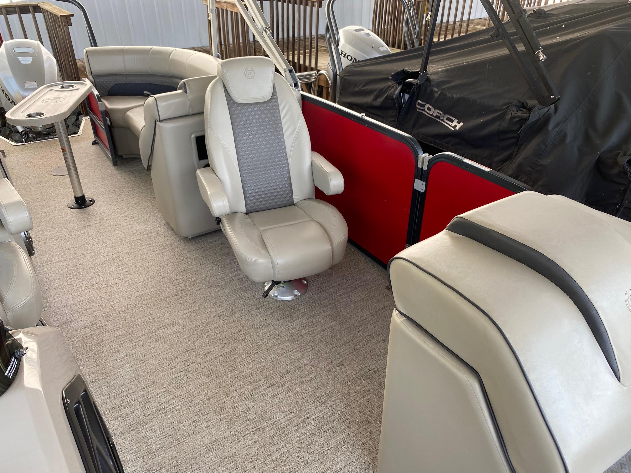 2021 Premier 230 Solaris RF boat interior with plush seating and modern design.