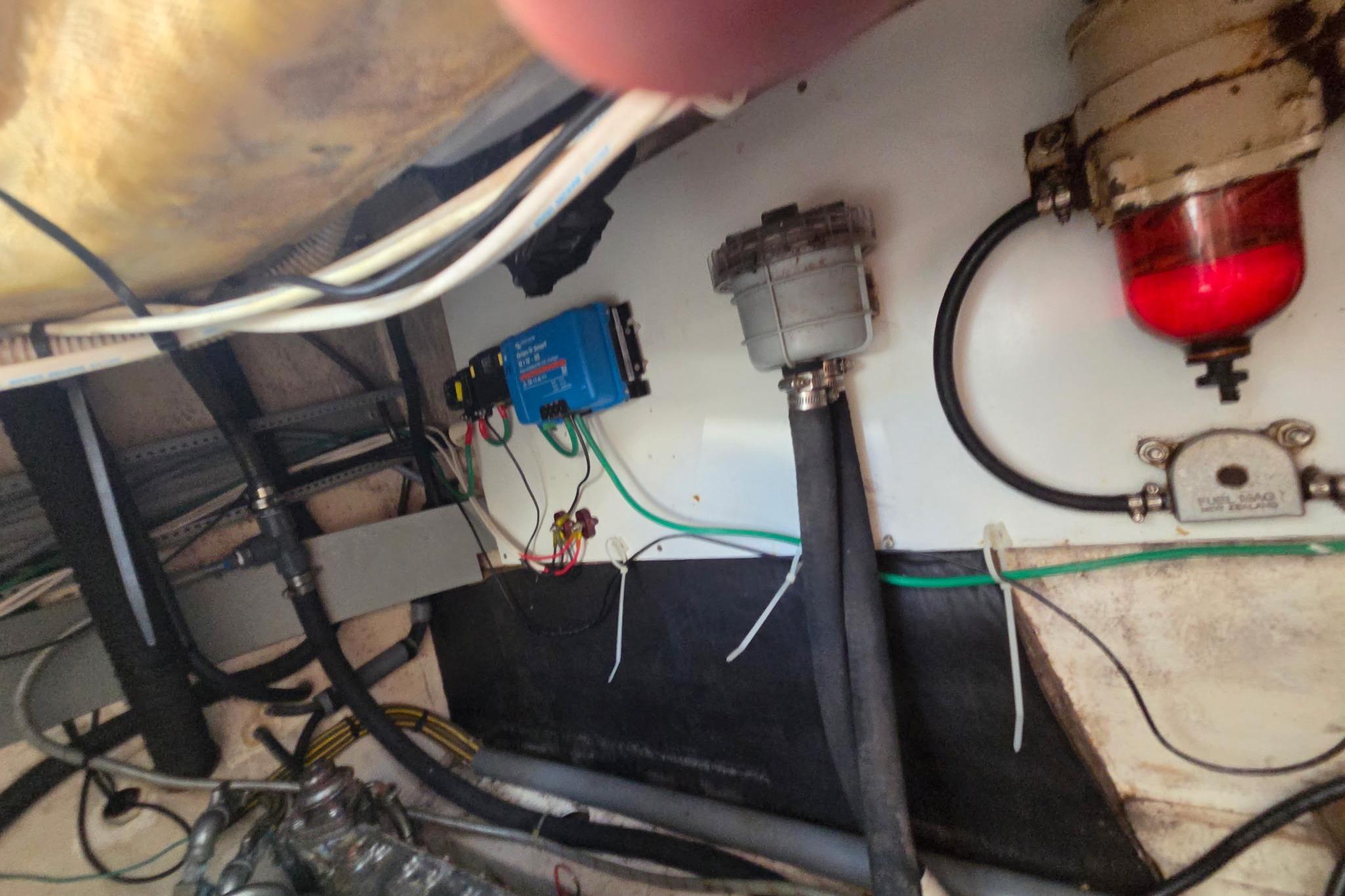 Engine room wiring and components of a 2000 Fountaine Pajot Maryland 37 boat.