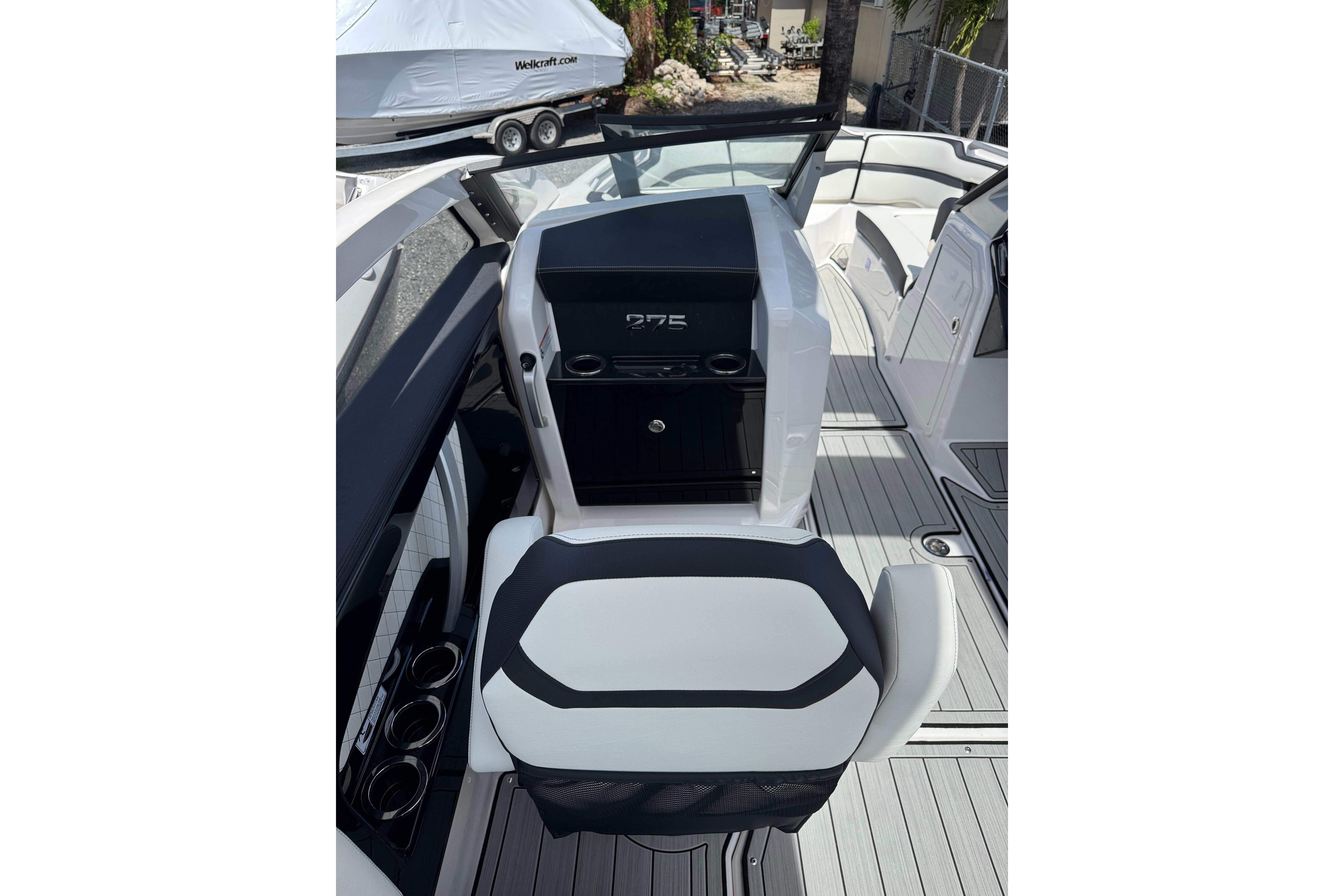 2026 Yamaha Boats 275SD interior with sleek seating and modern dashboard design.