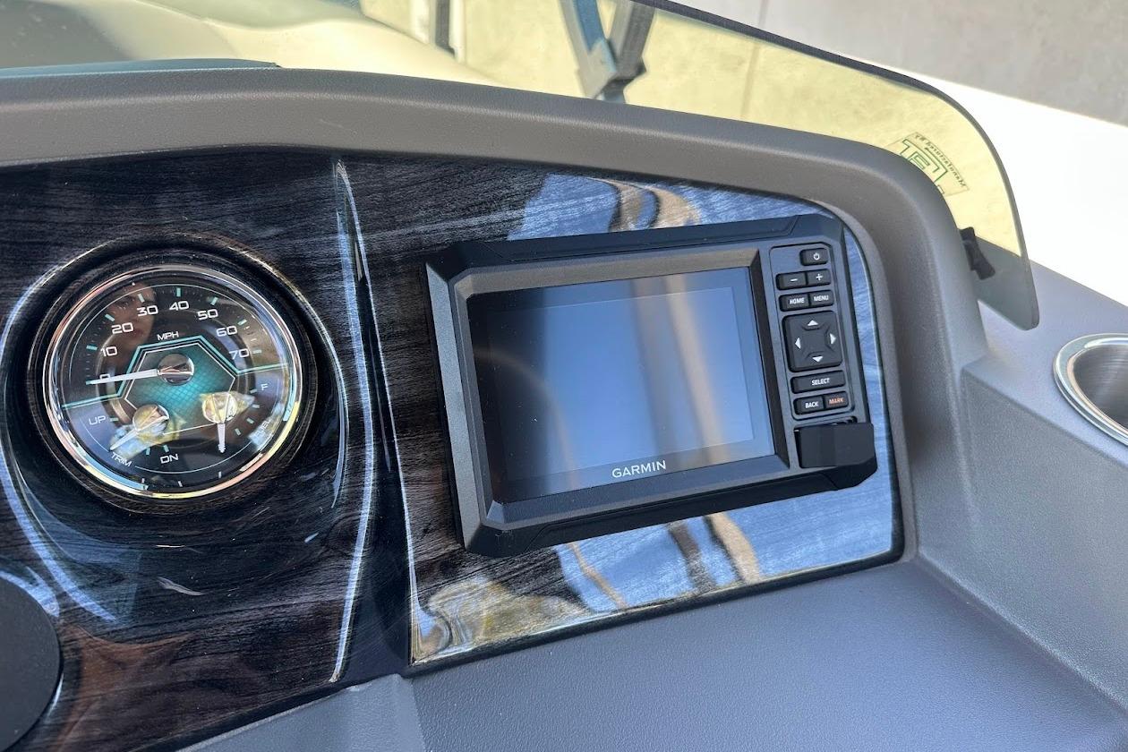 Dashboard of 2026 Tahoe Pontoon LTZ Quad Lounger Shift 23 with Garmin display.