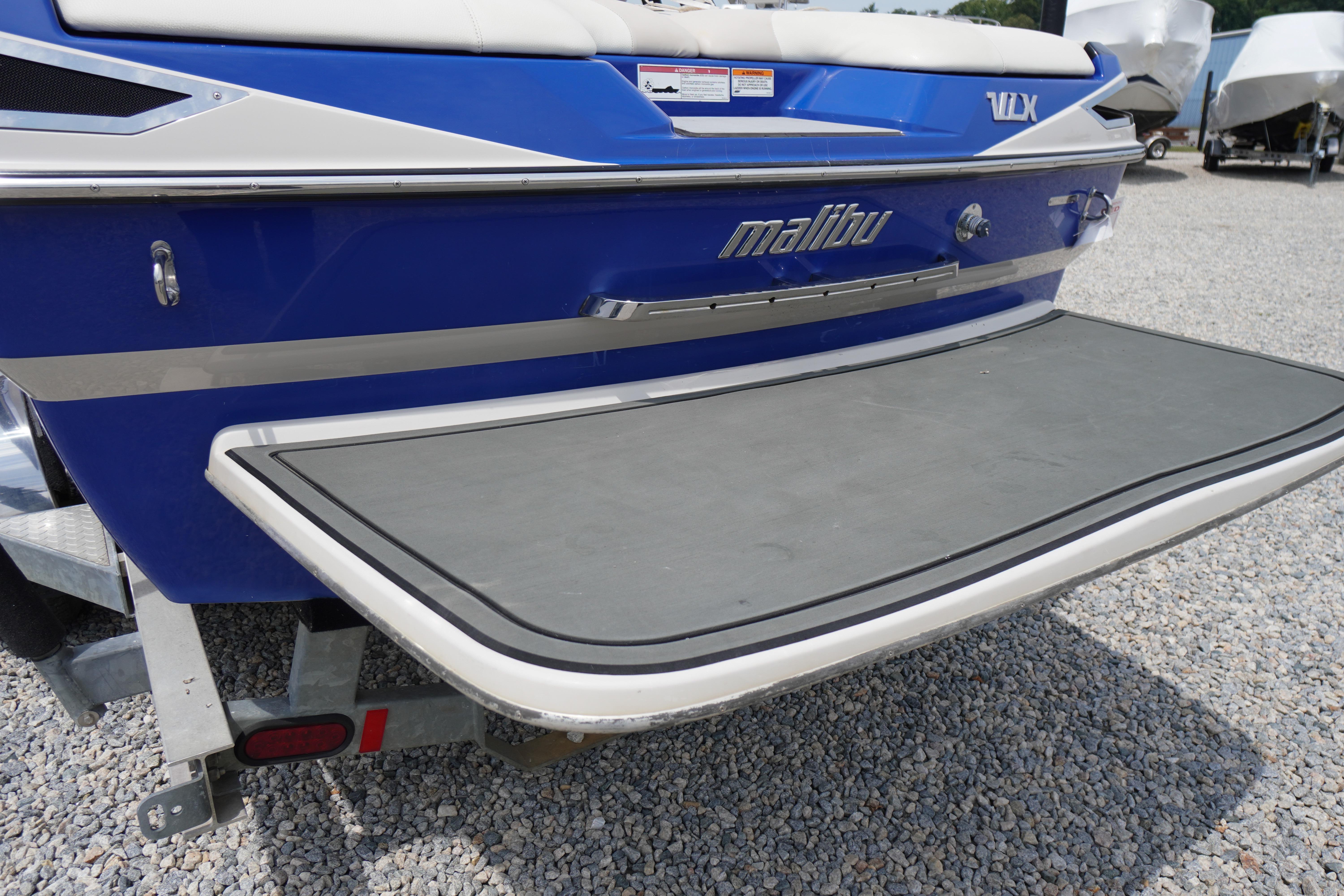 2011 Malibu Wakesetter 21 VLX boat rear view with swim platform.