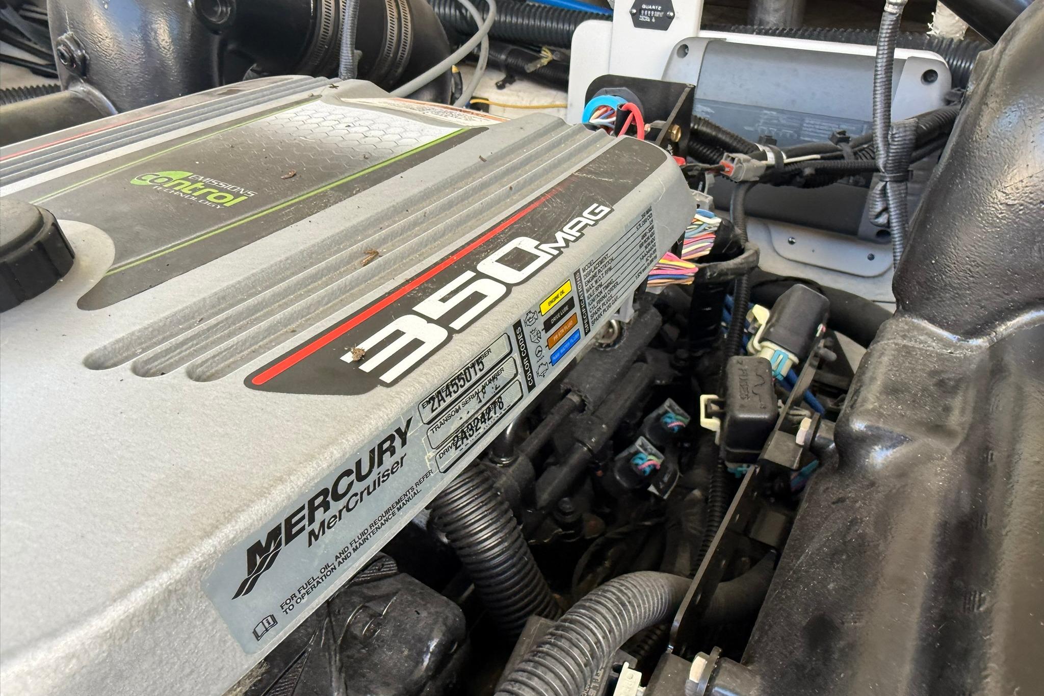 Engine of 2016 Crownline 255 SS boat, featuring Mercury MerCruiser 350 MAG.