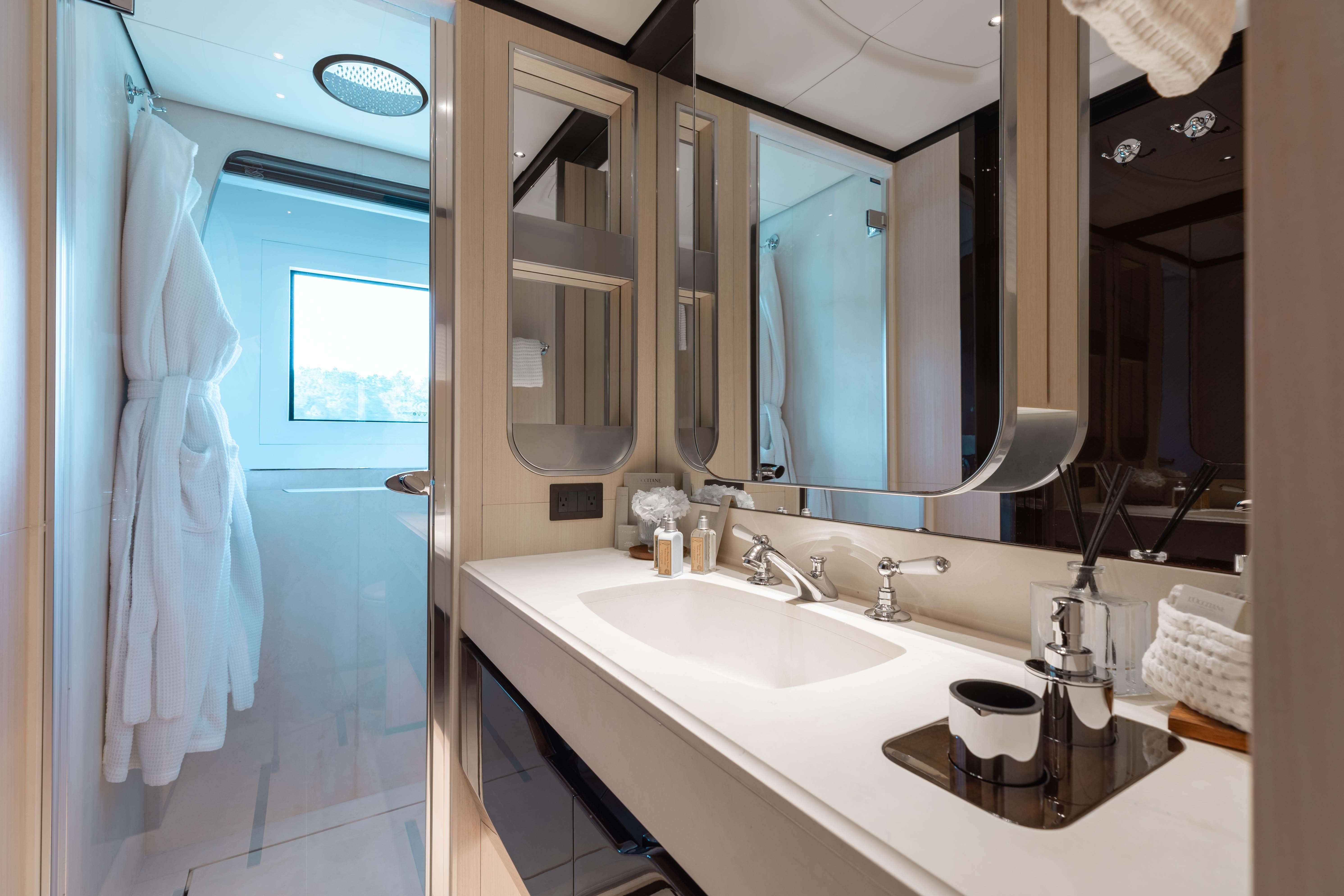 Luxurious bathroom on 2019 Benetti Delfino 95 yacht with modern fixtures and elegant design.