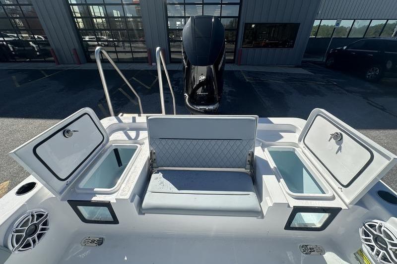 2026 Sportsman Masters 247 Bay Boat interior with open storage compartments and seating.