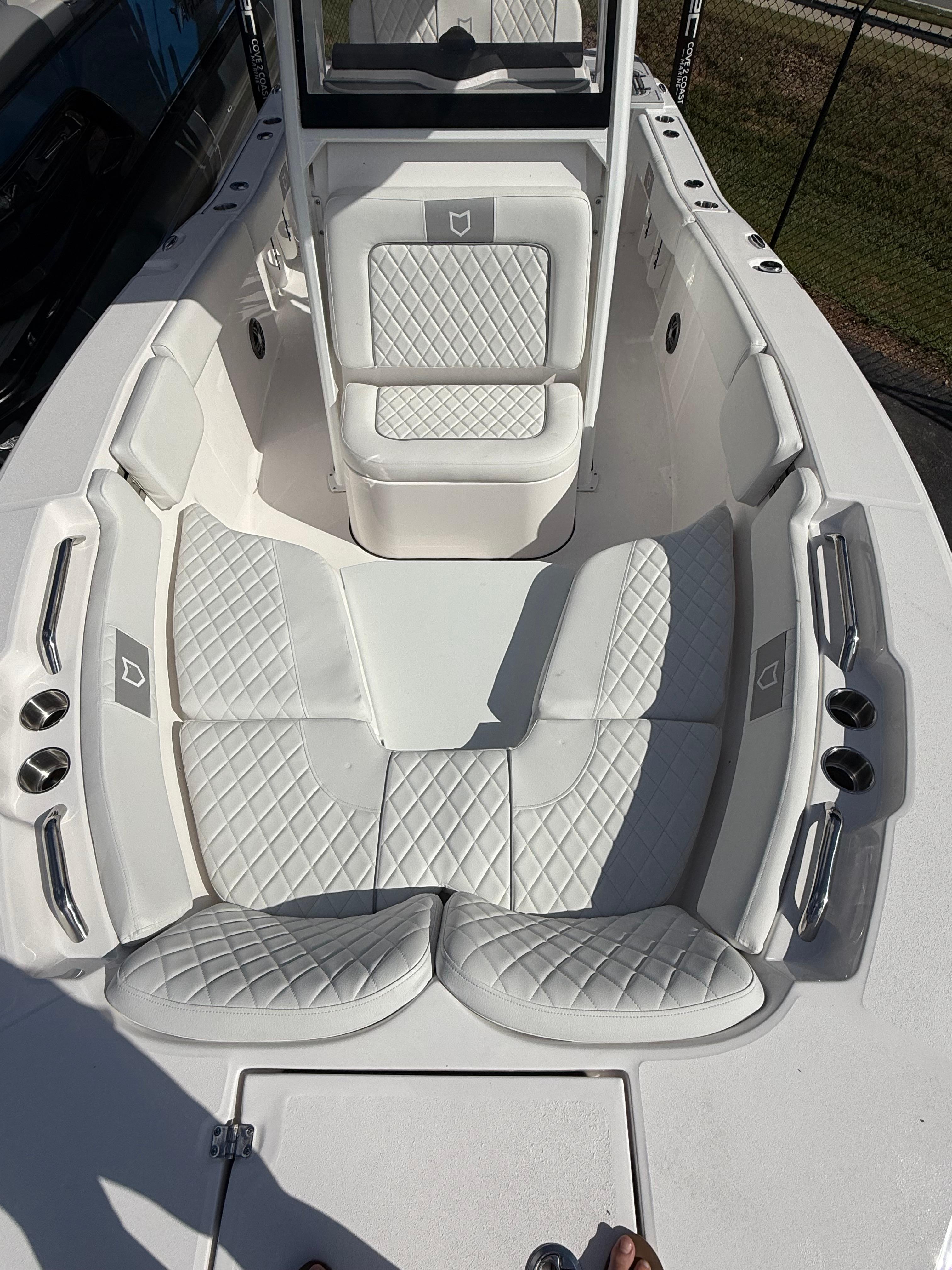2026 Sea Fox 228 Commander boat interior with white quilted seating.