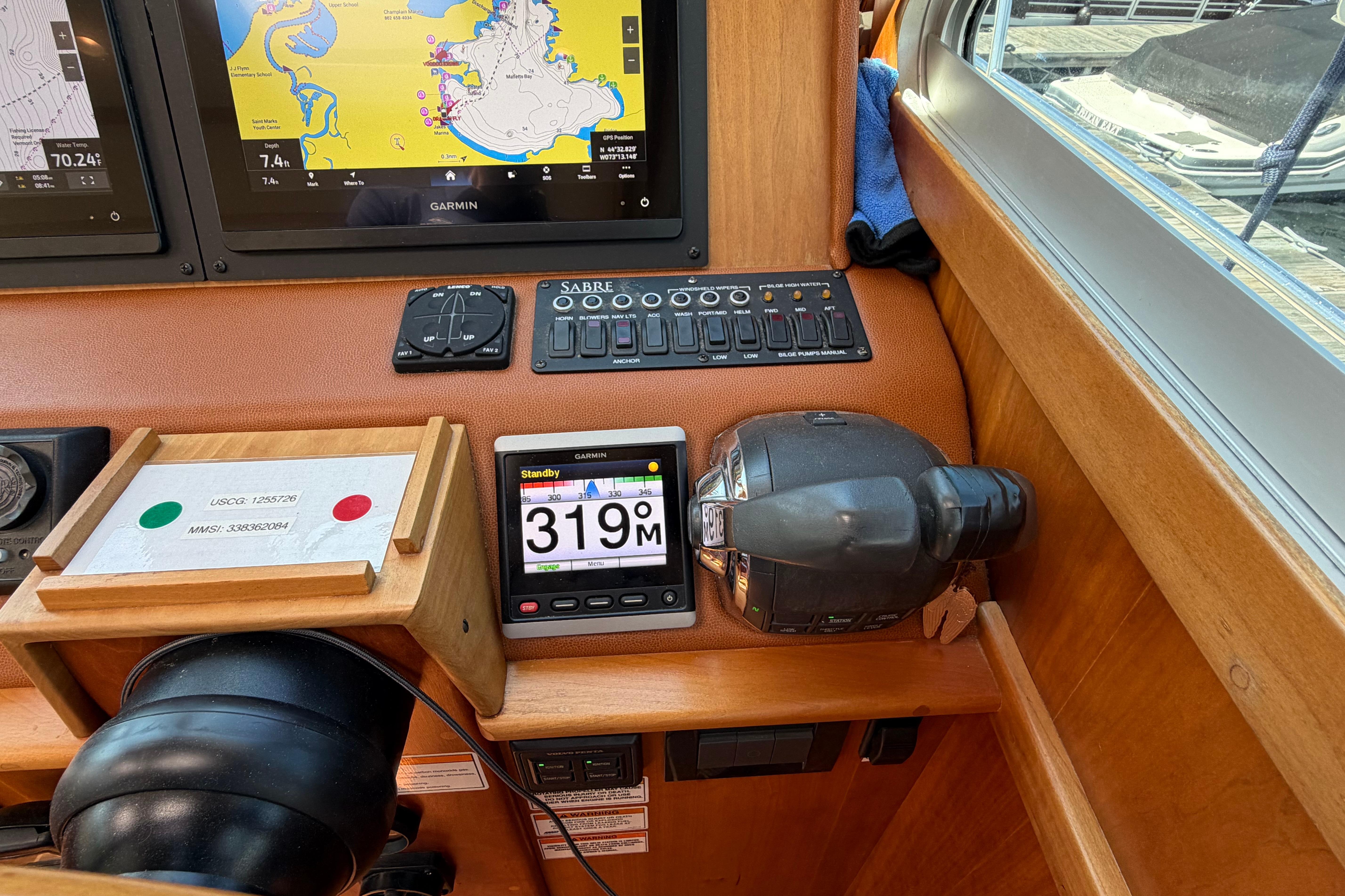 Control panel of a 2015 Sabre 38 Salon Express with navigation displays and controls.