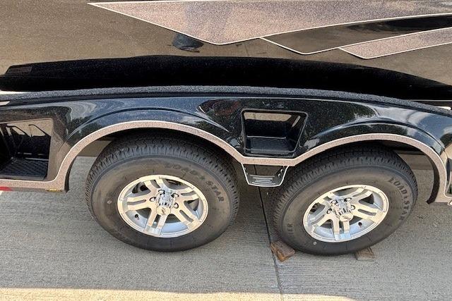2026 Ranger 212LS trailer with dual wheels on a concrete surface.