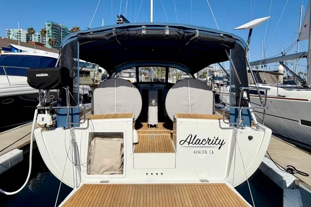 2016 Hanse 455 sailboat docked, featuring a spacious cockpit and elegant design.