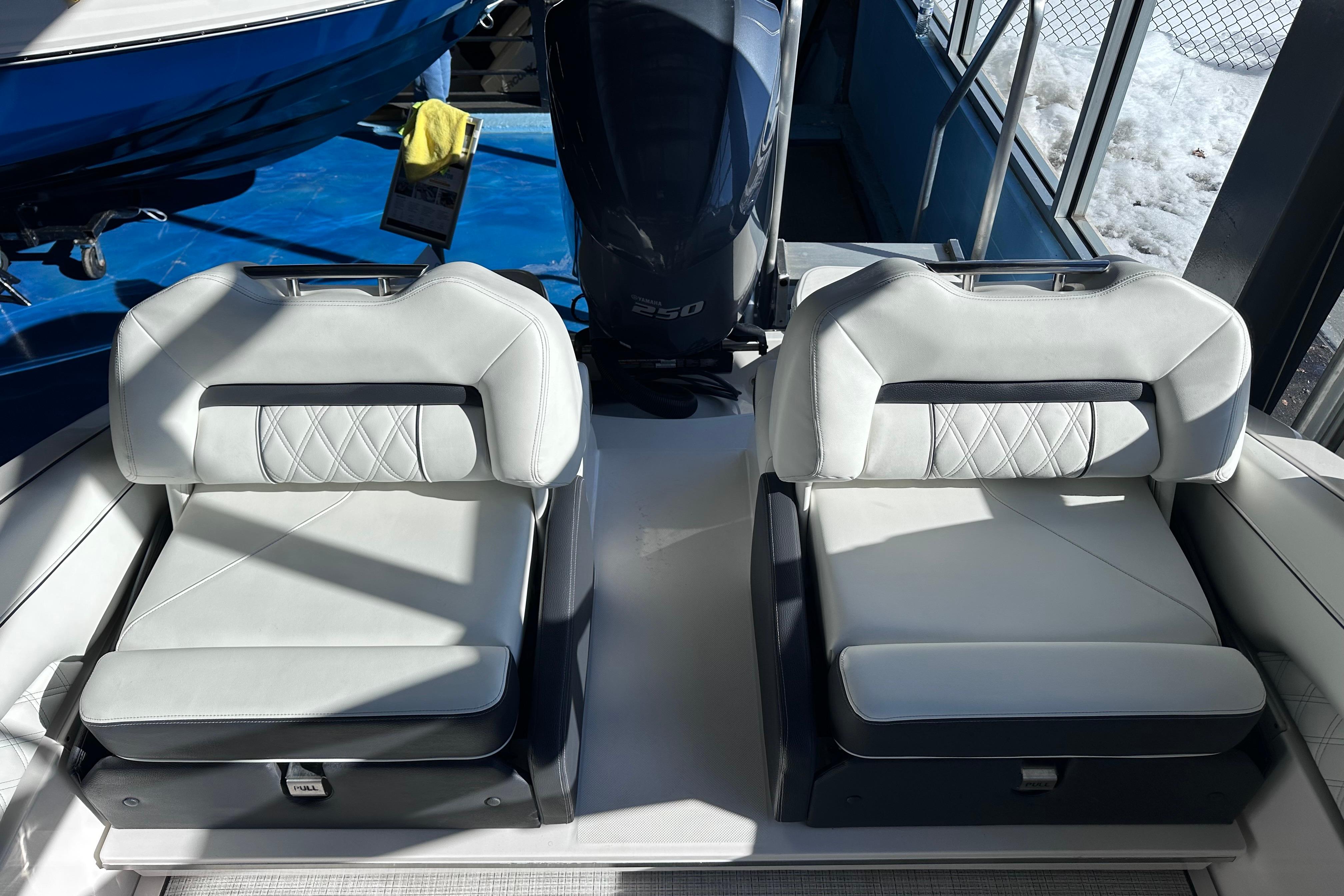 2026 Regal LX4 boat interior with luxurious white seating and modern design.