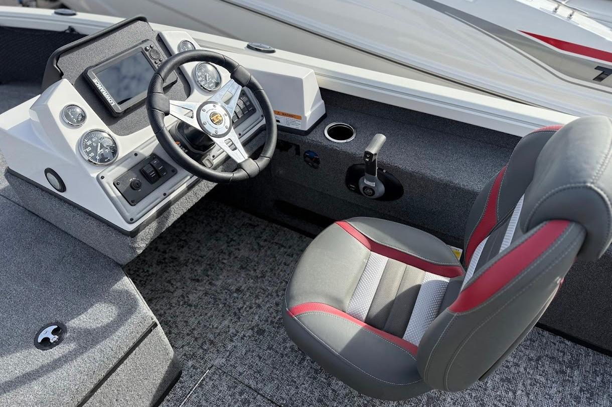 2026 Ranger VS1882SC Reata boat cockpit with steering wheel and control panel.