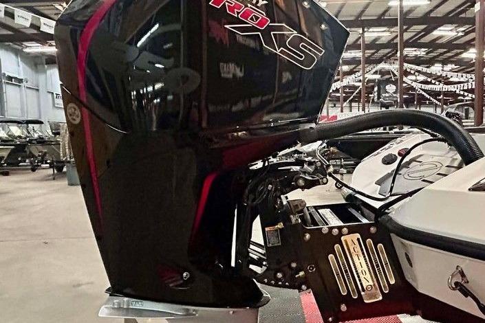 2026 Ranger Z521R Cup-Equipped boat engine in a showroom setting.