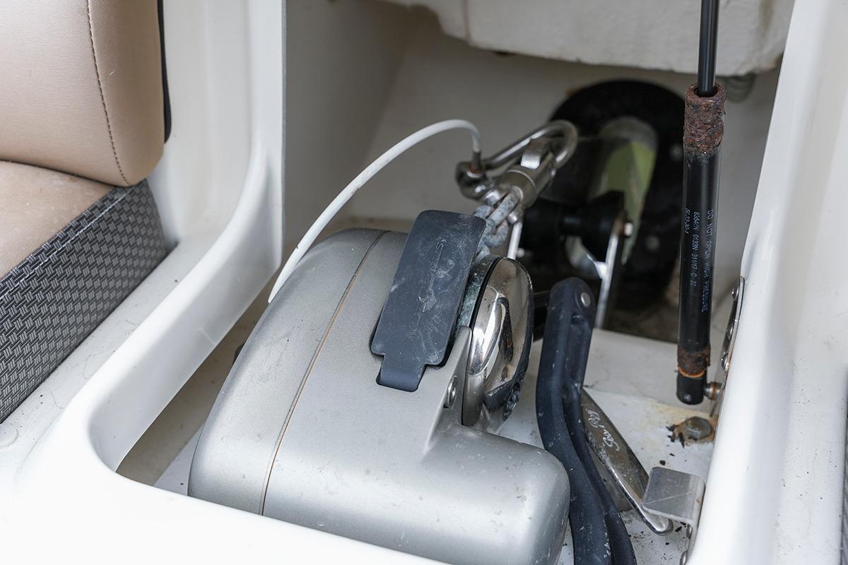 2018 Sea Ray SLX 350 boat anchor compartment with winch and cable.
