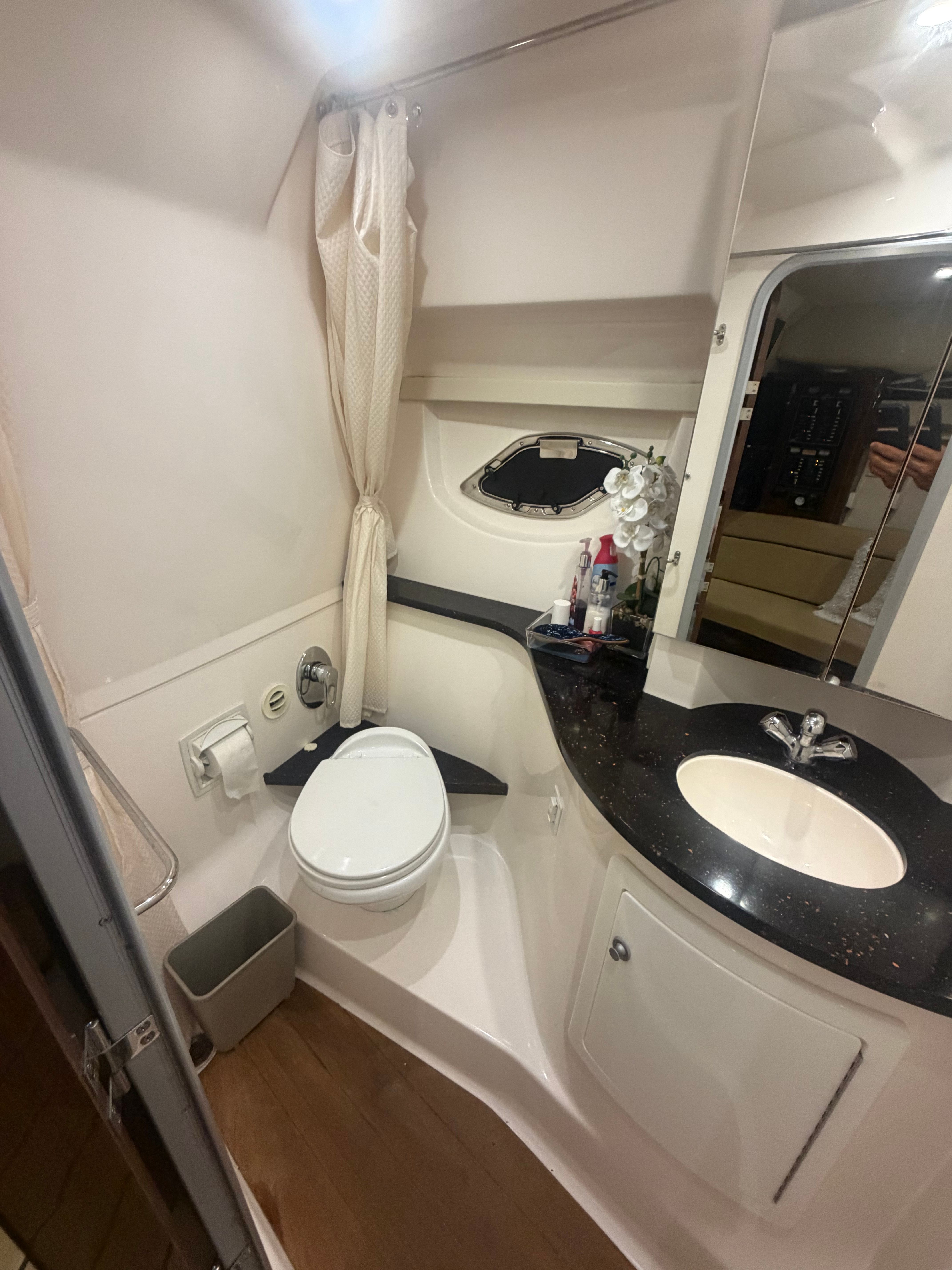 2015 Regal 35 Sport Coupe bathroom with sink and toilet.