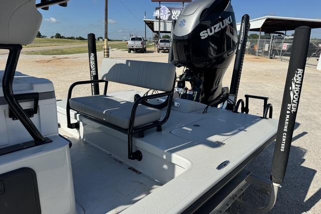 2025 Majek 24 Reaper boat with Suzuki engine, featuring a spacious deck and seating.