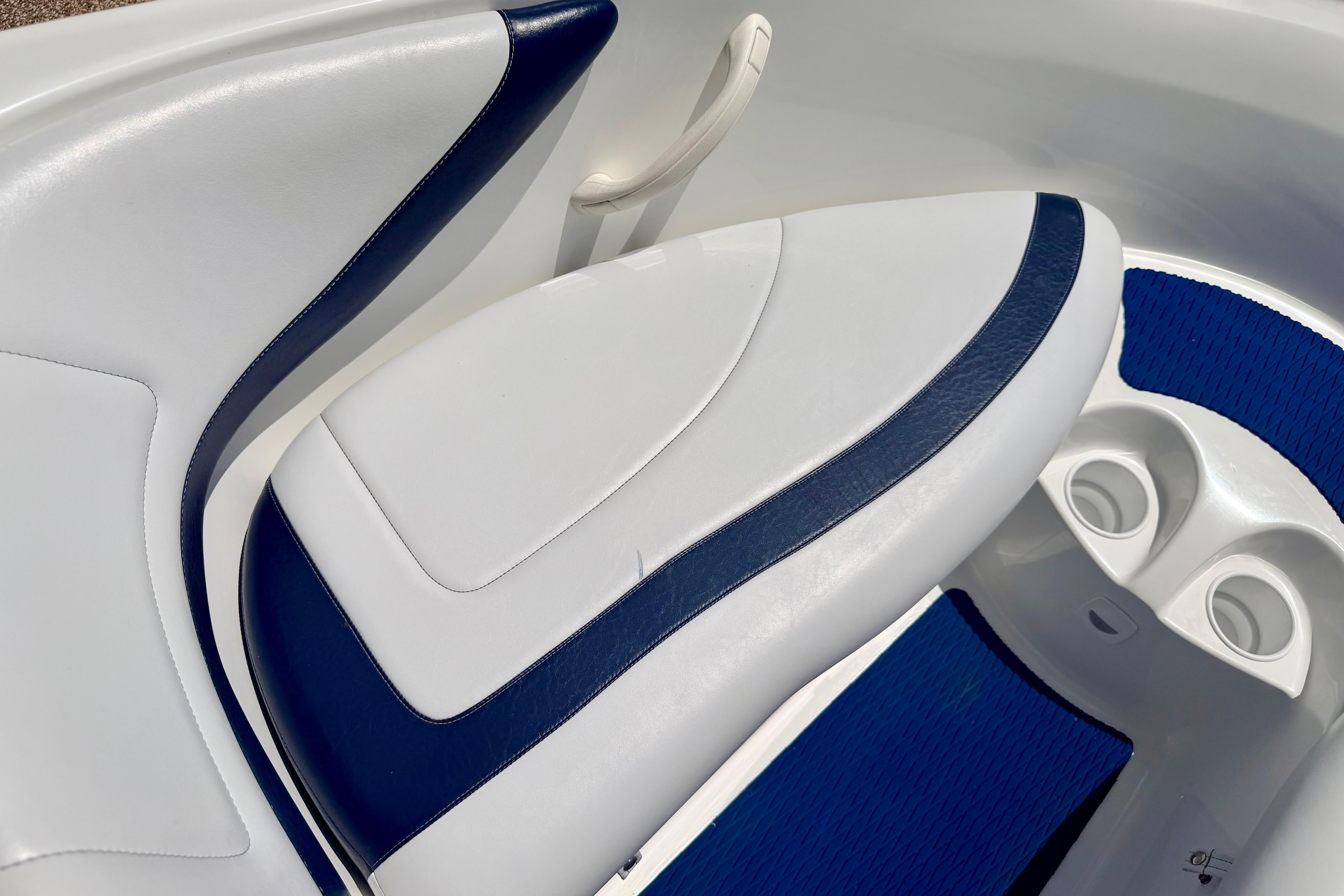 2004 Bombardier SEADOO Utopia 185 boat interior with white and blue seating.