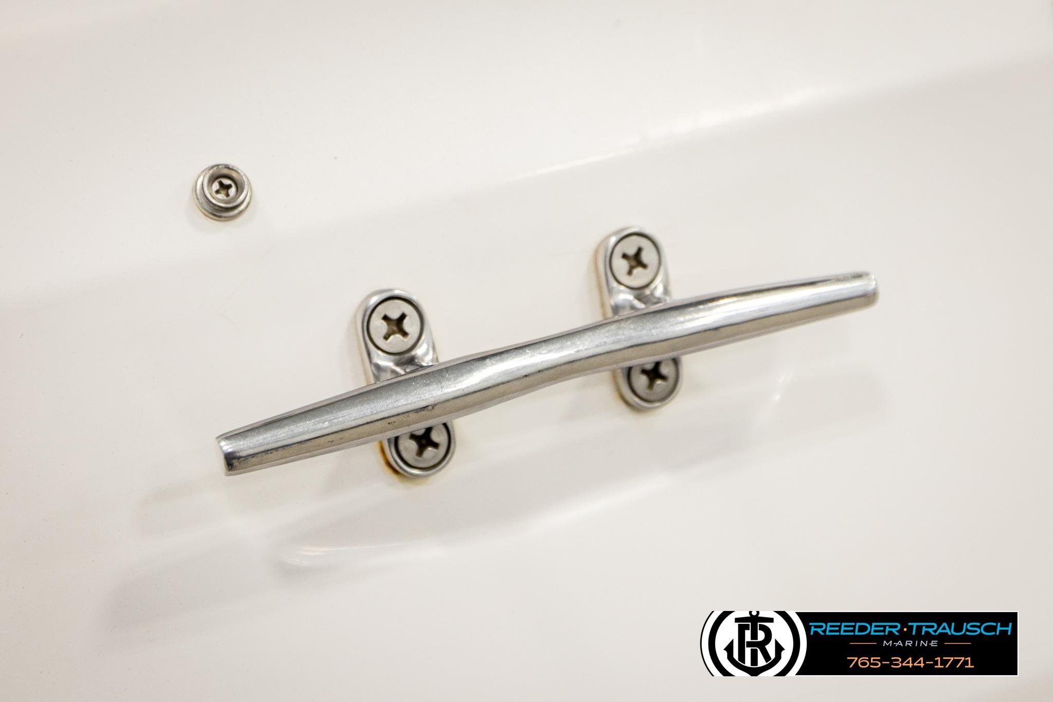Chrome boat cleat on 2016 Tahoe 450 TS, Reeder-Trausch Marine branding visible.
