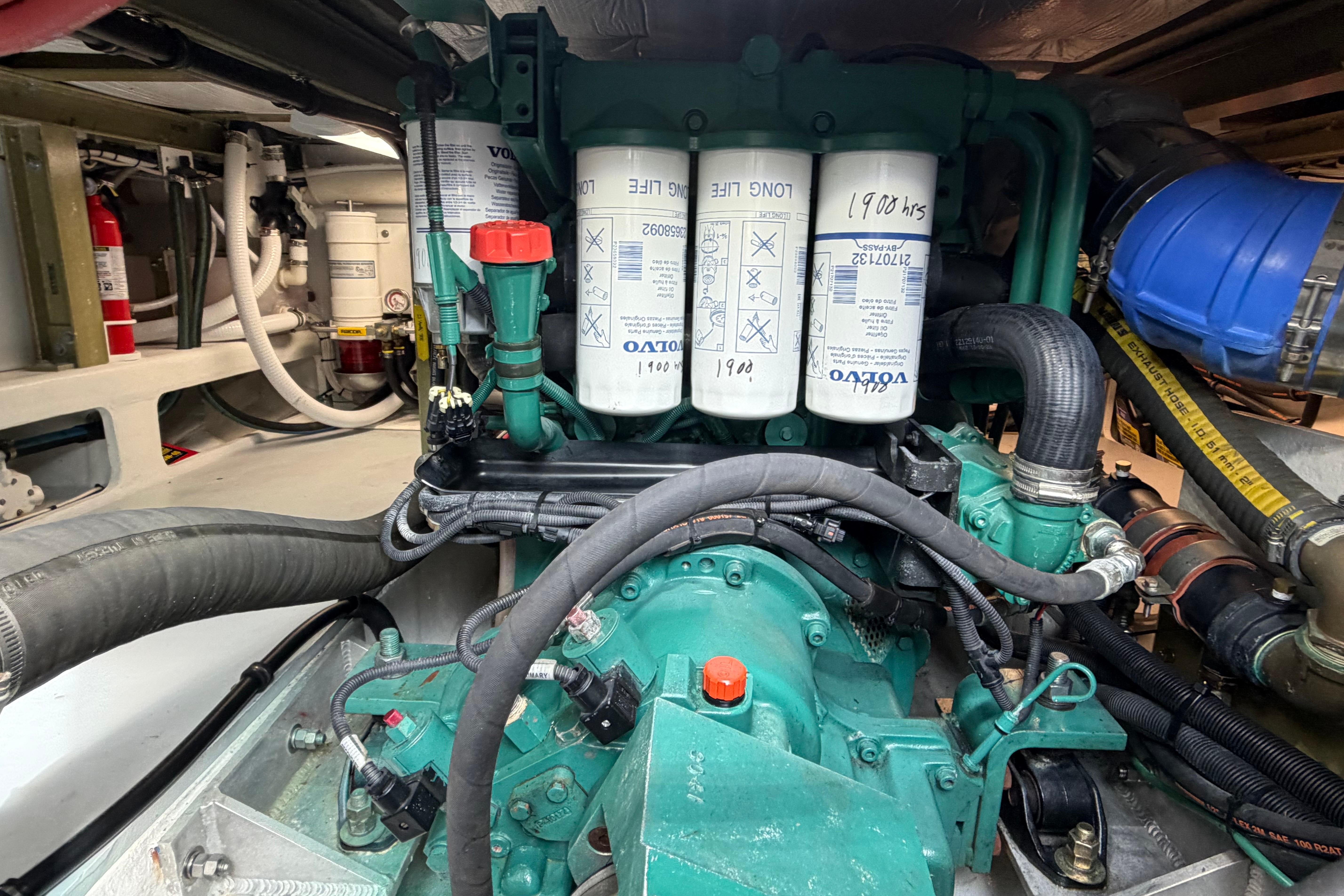 Engine compartment of a 2018 H&H Marine Osmond Beal boat, featuring Volvo components.