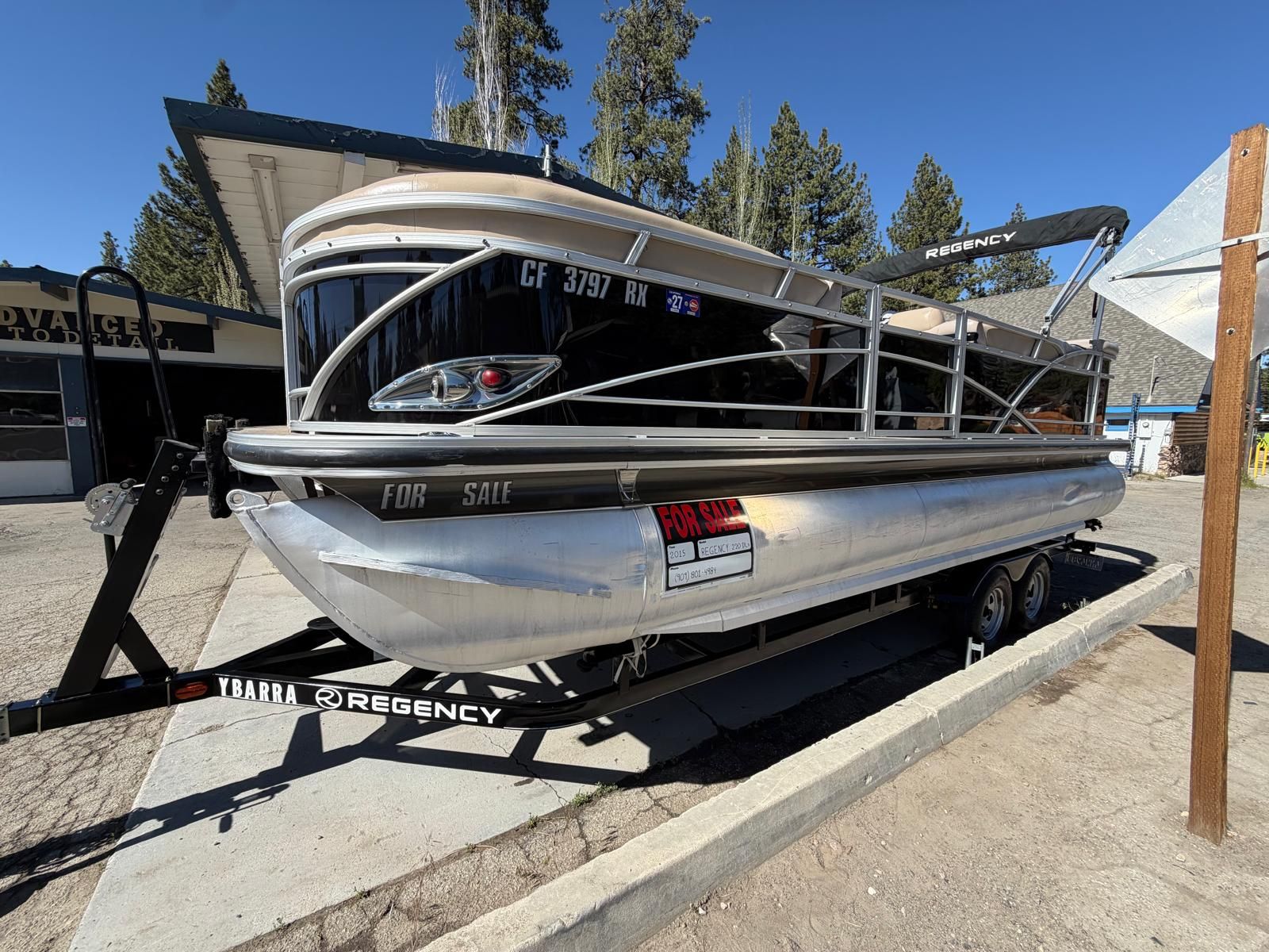 2015 Regency 220DL3 pontoon boat for sale on trailer.