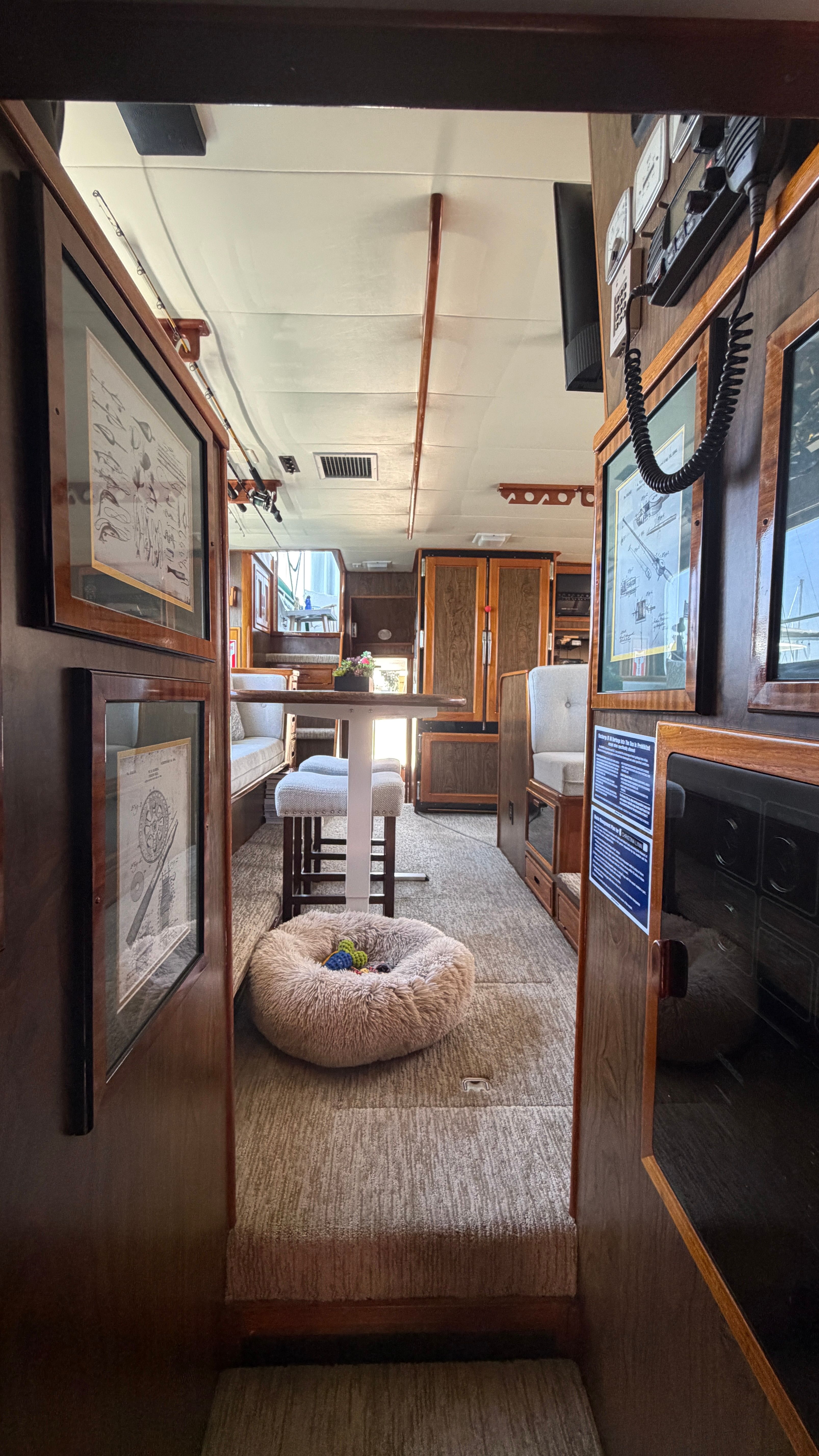 Interior of a 1966 Drake Yachtfisher with wooden furnishings.
