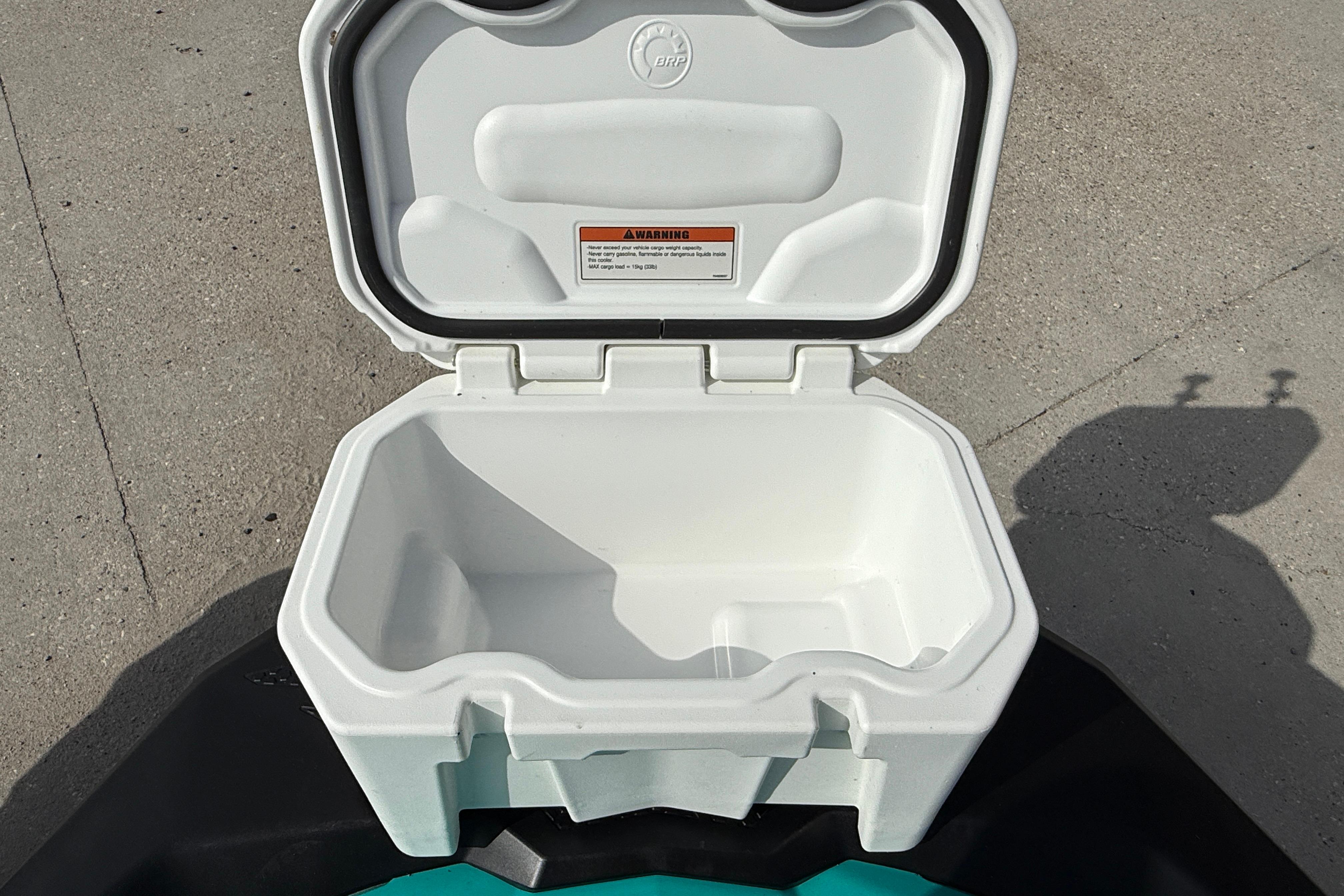 Open storage compartment on 2022 Sea-Doo Spark 3up, showing interior space.