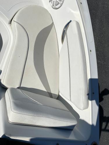 2019 Caravelle 19 EBo Bowrider white cushioned seating.