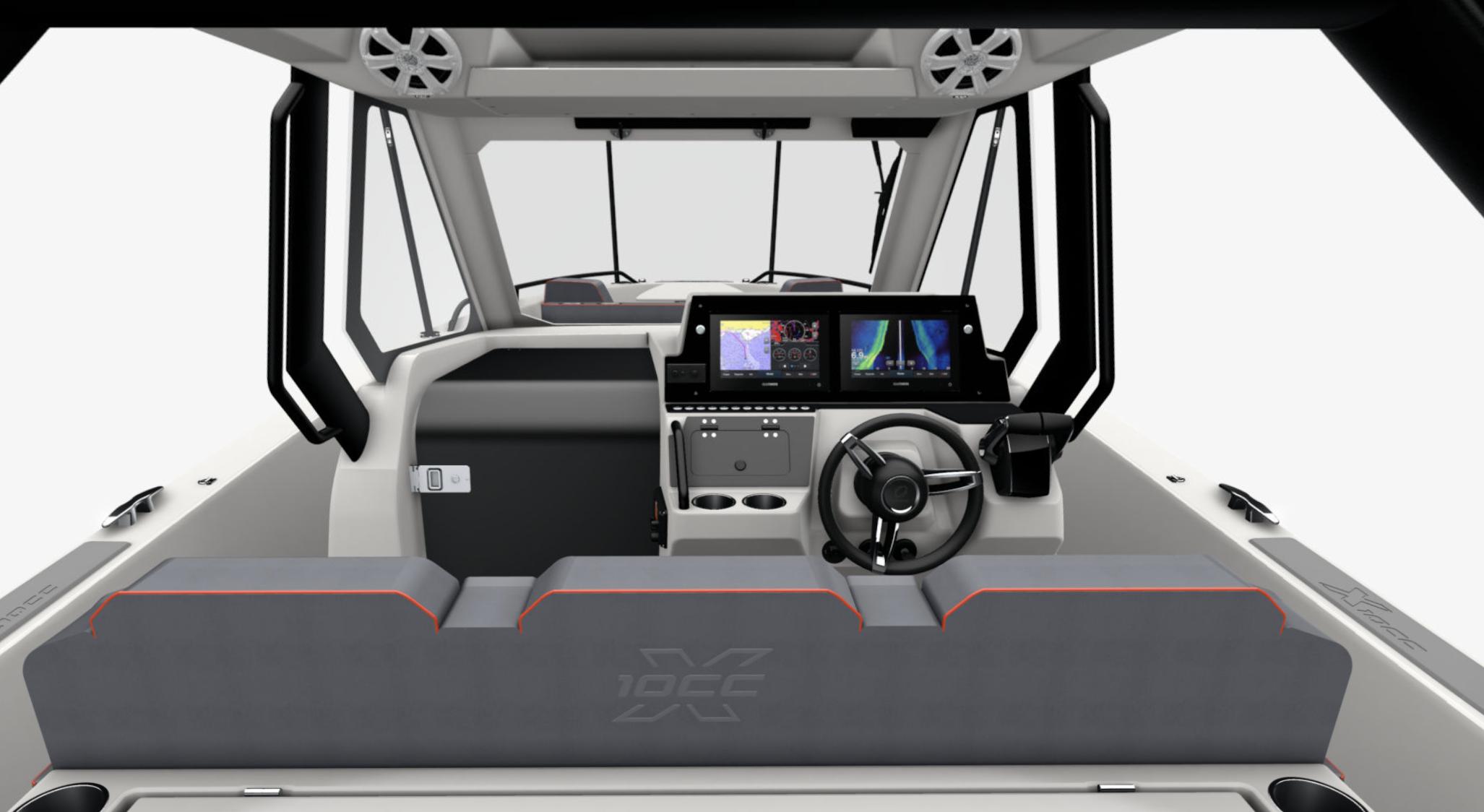 Interior of 2025 Zodiac X10CC boat with modern dashboard and steering wheel.