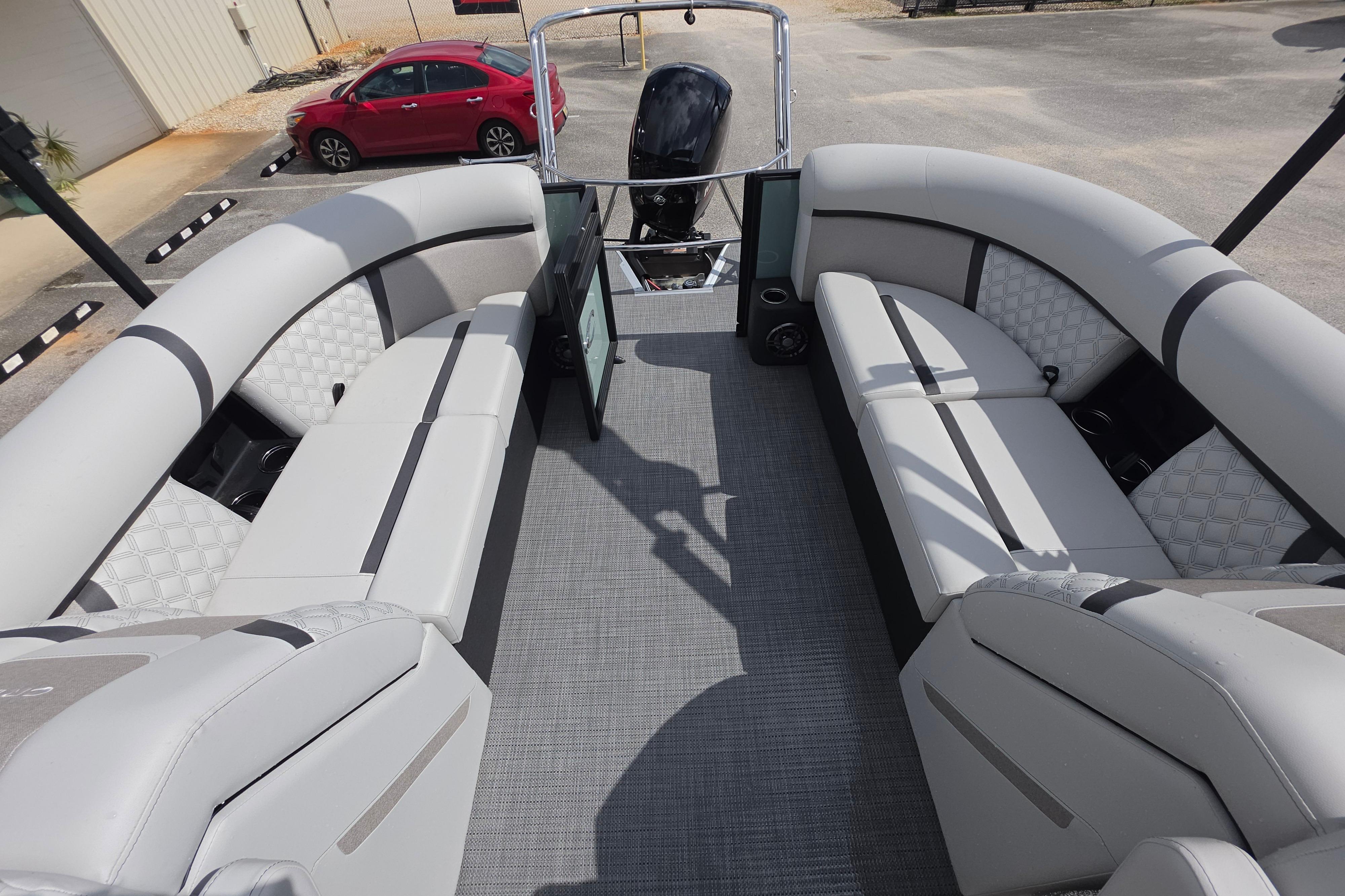 2026 Crest 235 Conquest SLC pontoon boat with spacious seating and modern design.