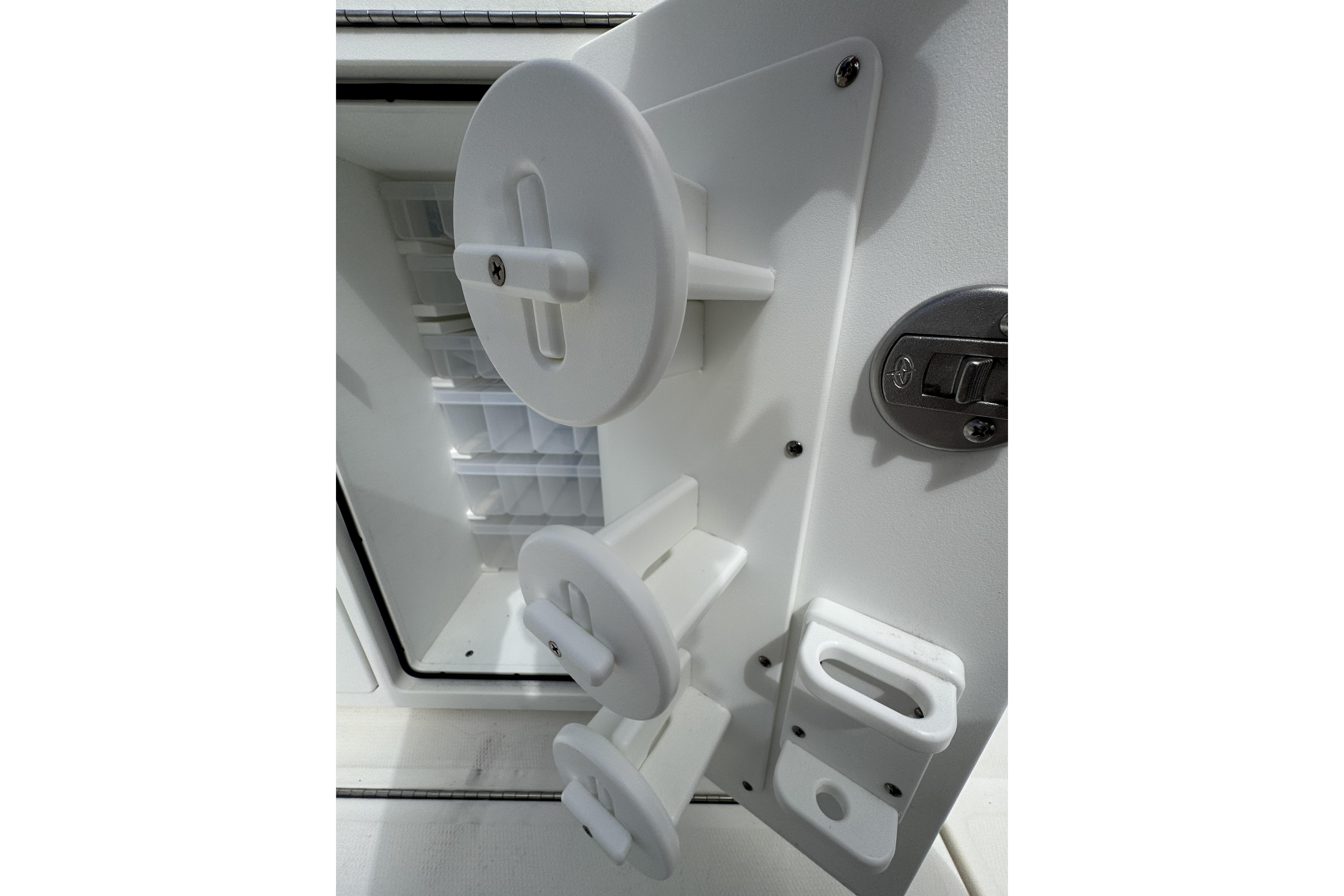 Interior view of a 2018 Regulator 34SS boat compartment with storage features.
