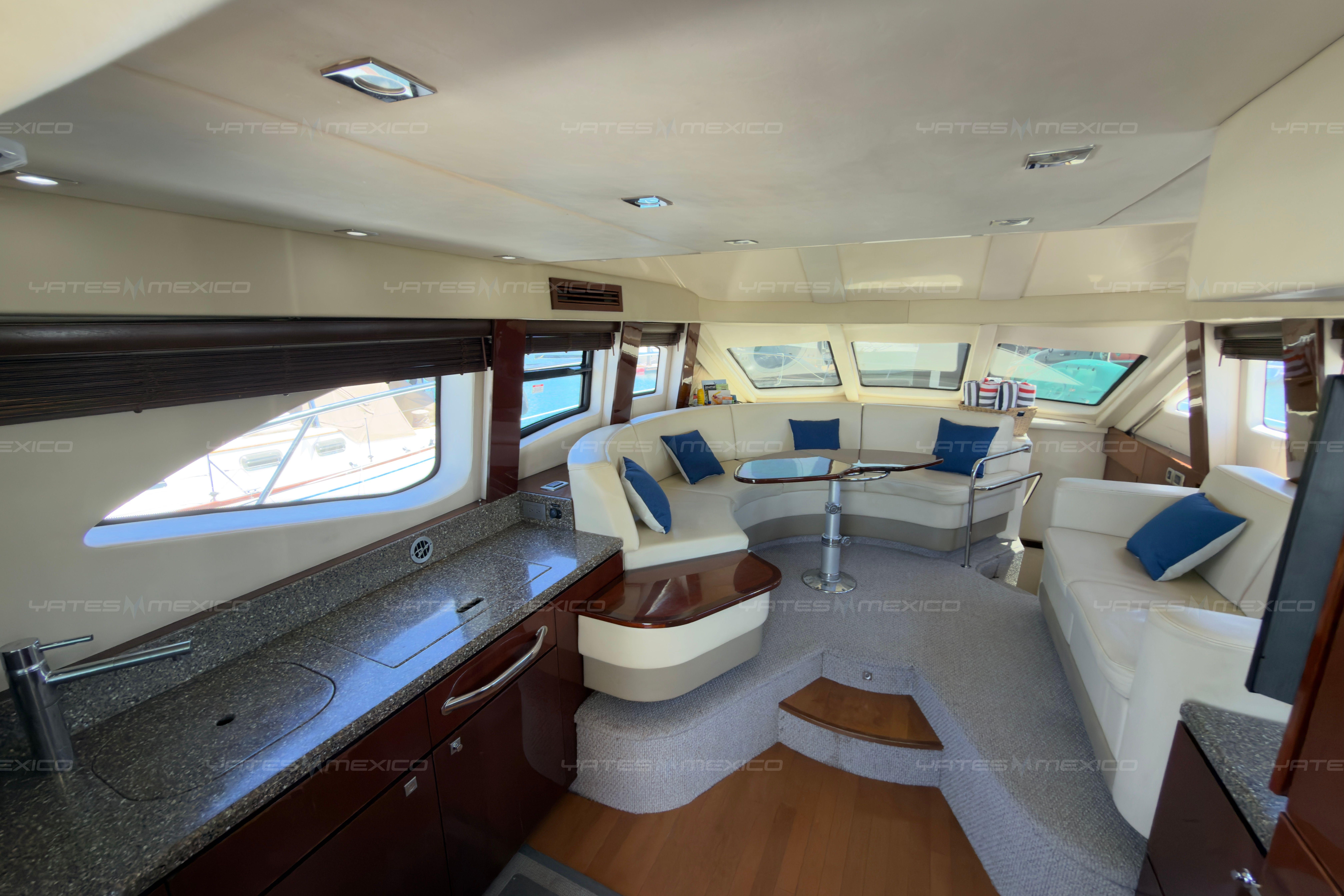 Luxurious interior of a 2008 Sea Ray 480 Sedan Bridge yacht with elegant seating and modern amenities.