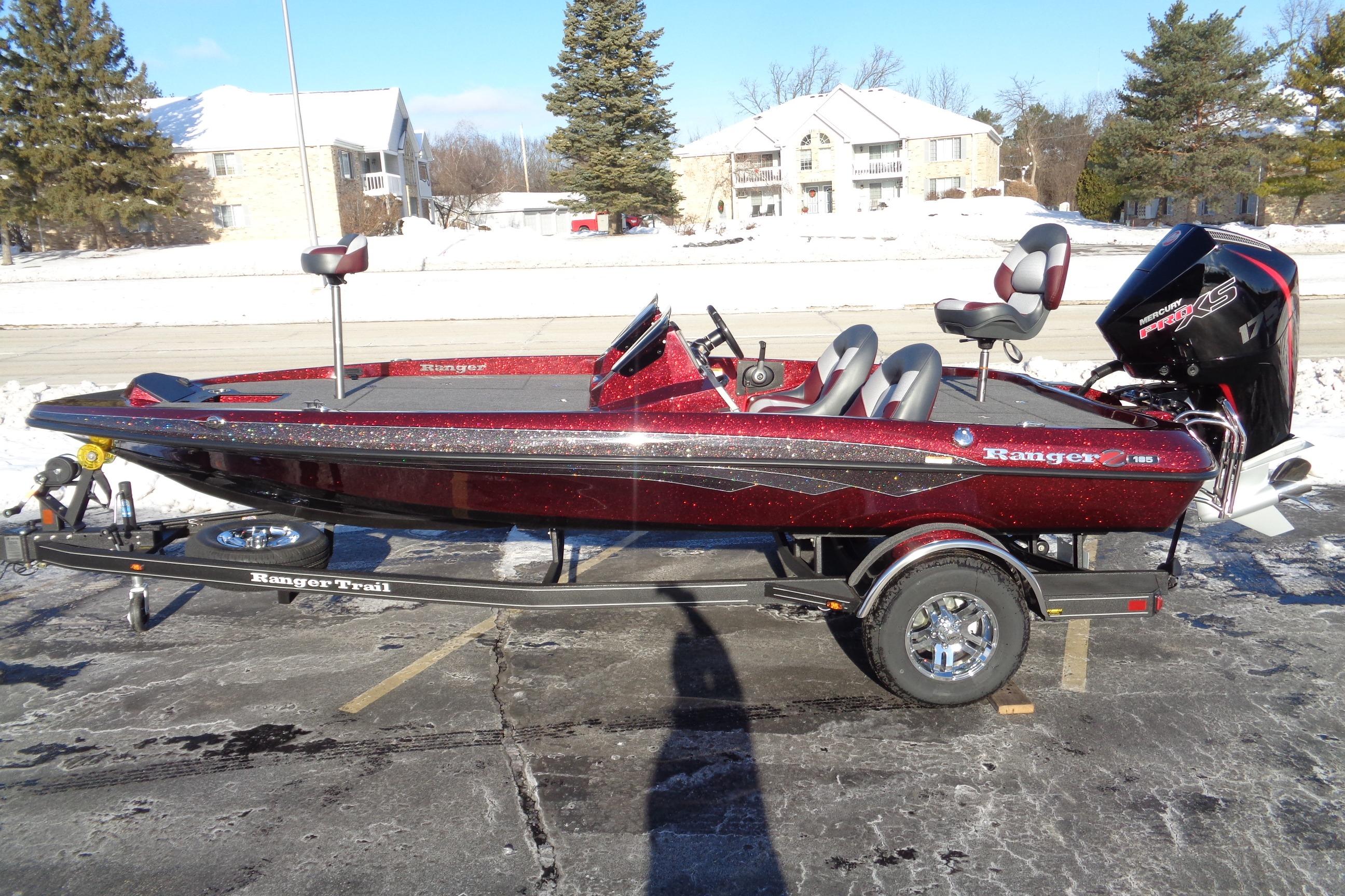 2026 Ranger Z185 boat on trailer in snowy parking lot.
