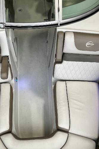 2023 Crownline Eclipse E235 XS boat interior with beige and white seating.