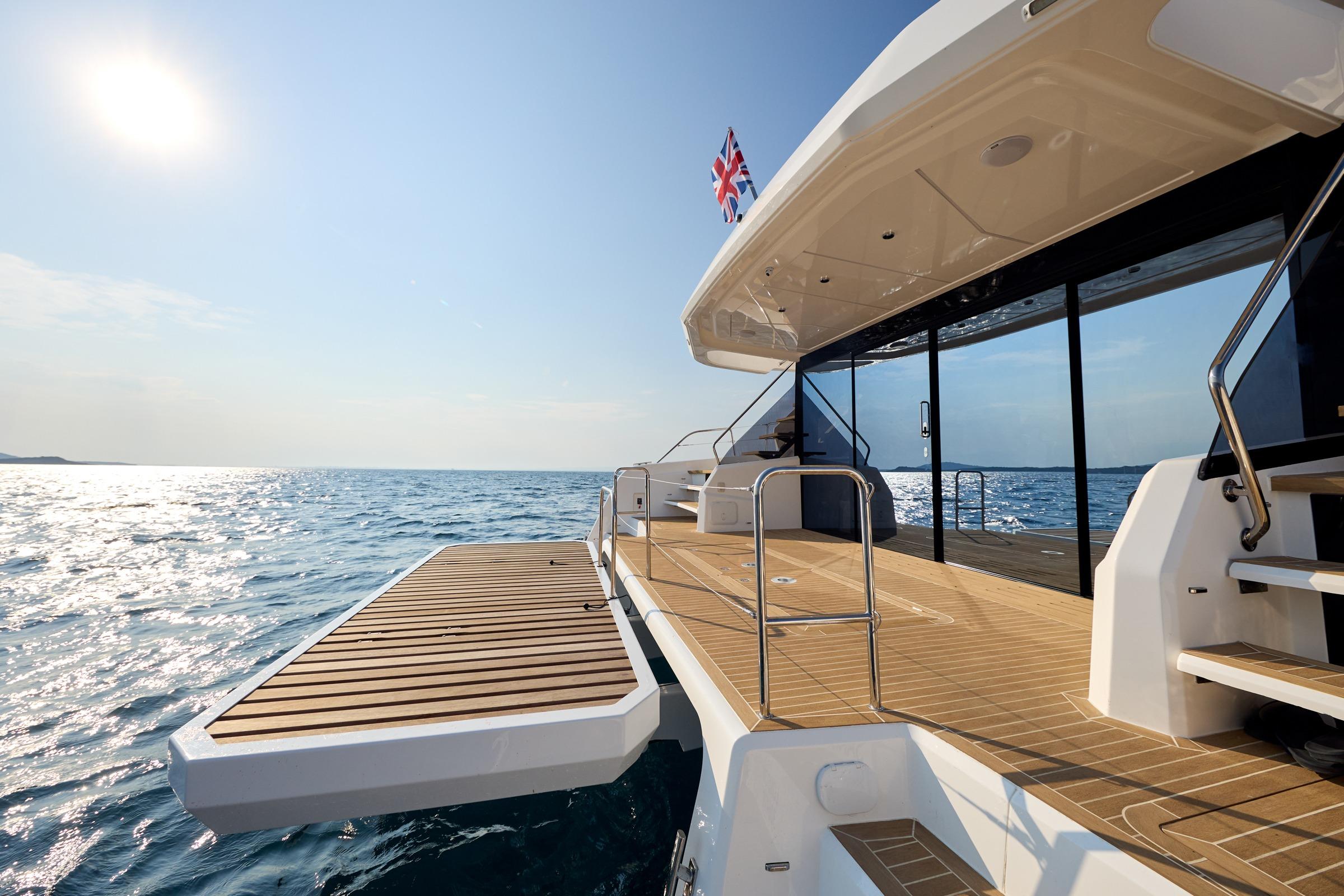 Custom Omaya 50 Power Catamaran 2025 on open sea, featuring spacious deck and modern design.