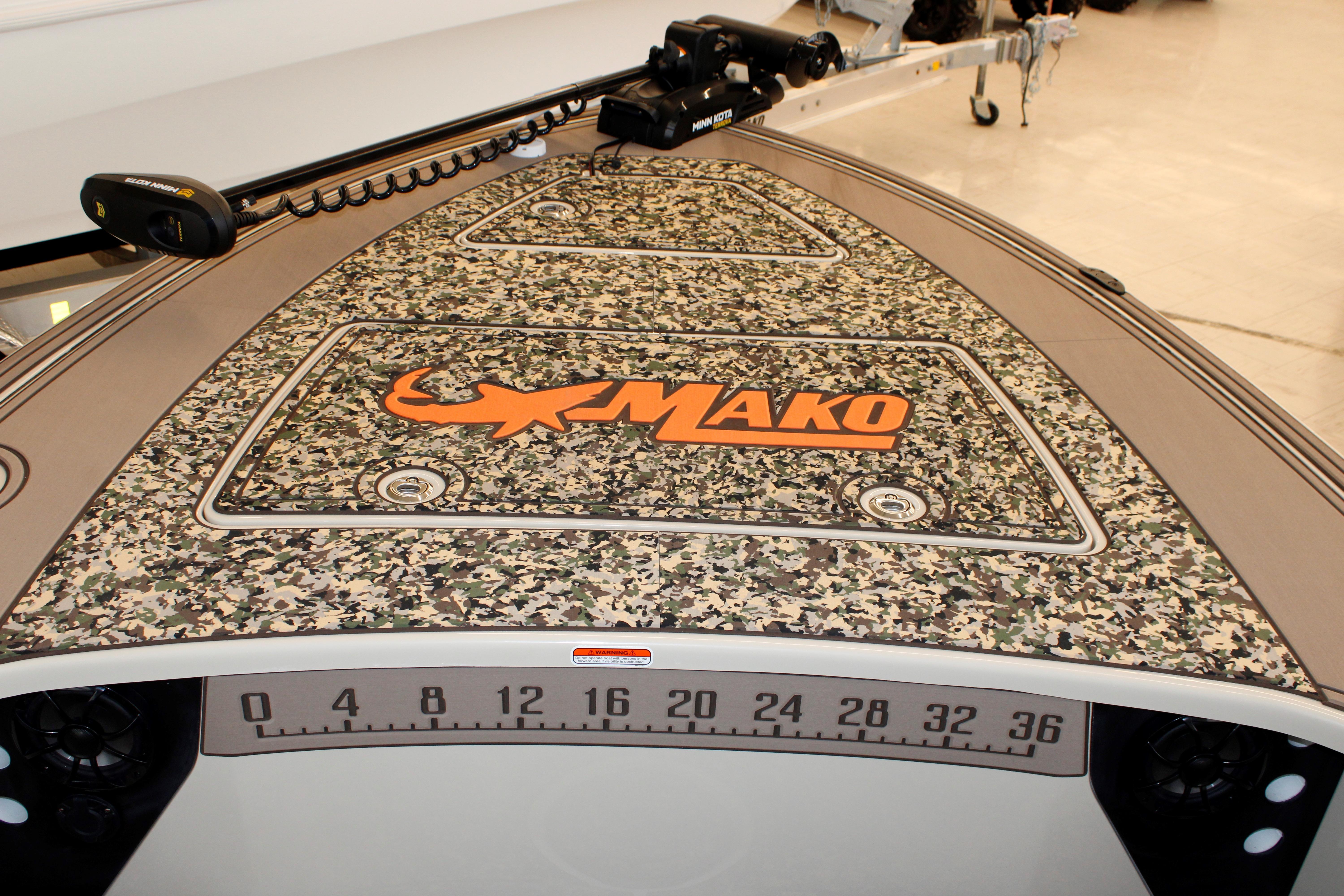 2026 Mako 18 Pro Skiff Backwater Edition with camo deck and measuring ruler.