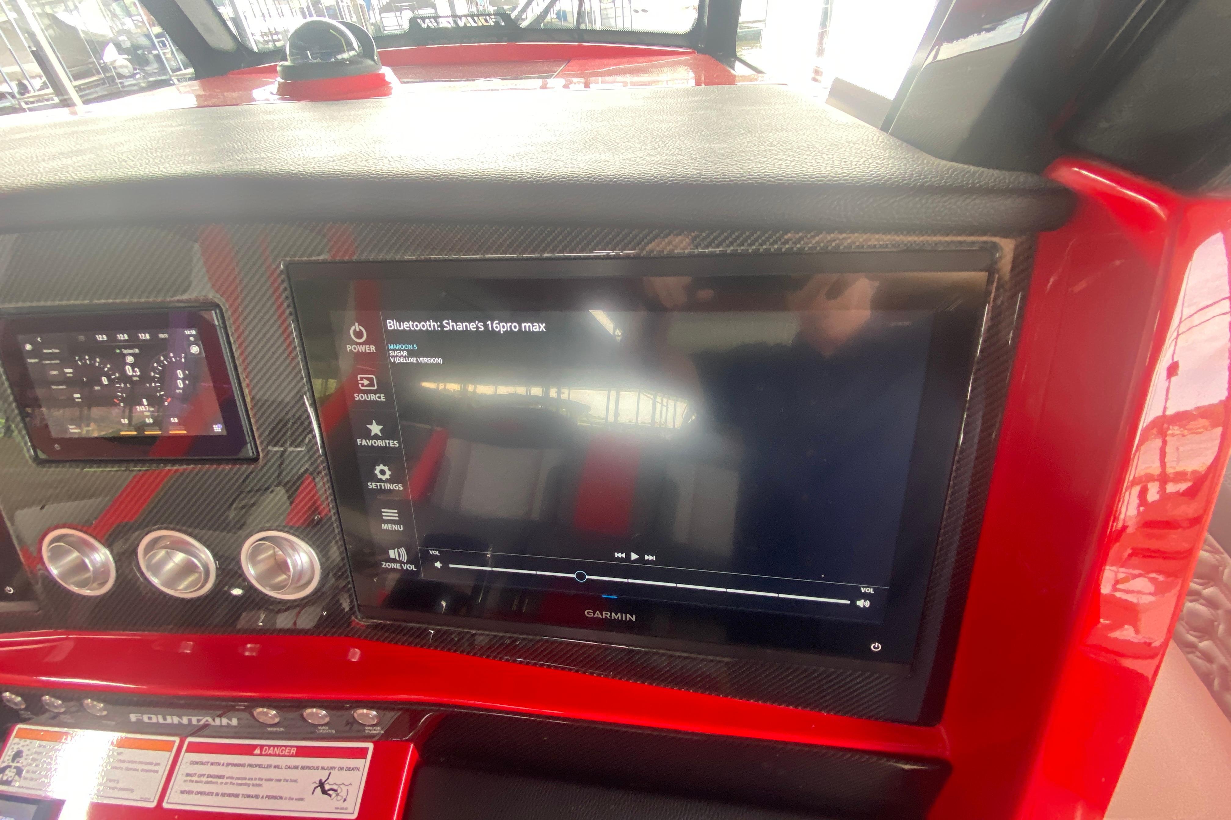 2025 Fountain 38 SCX dashboard with touchscreen display and control panel.