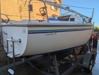 2002 Catalina Capri sailboat on trailer, side view.