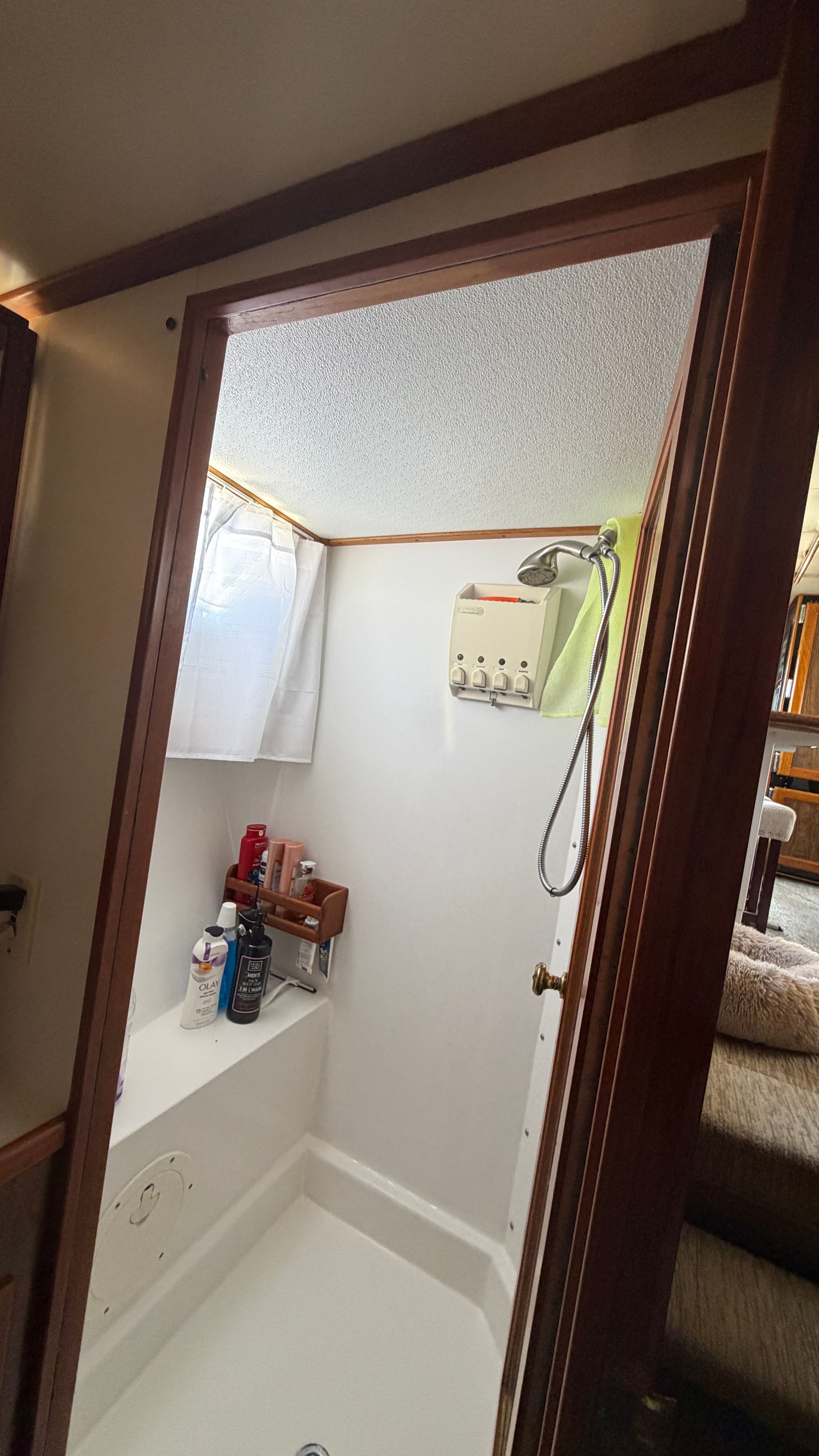Bathroom in a 1966 Drake Yachtfisher with shower.